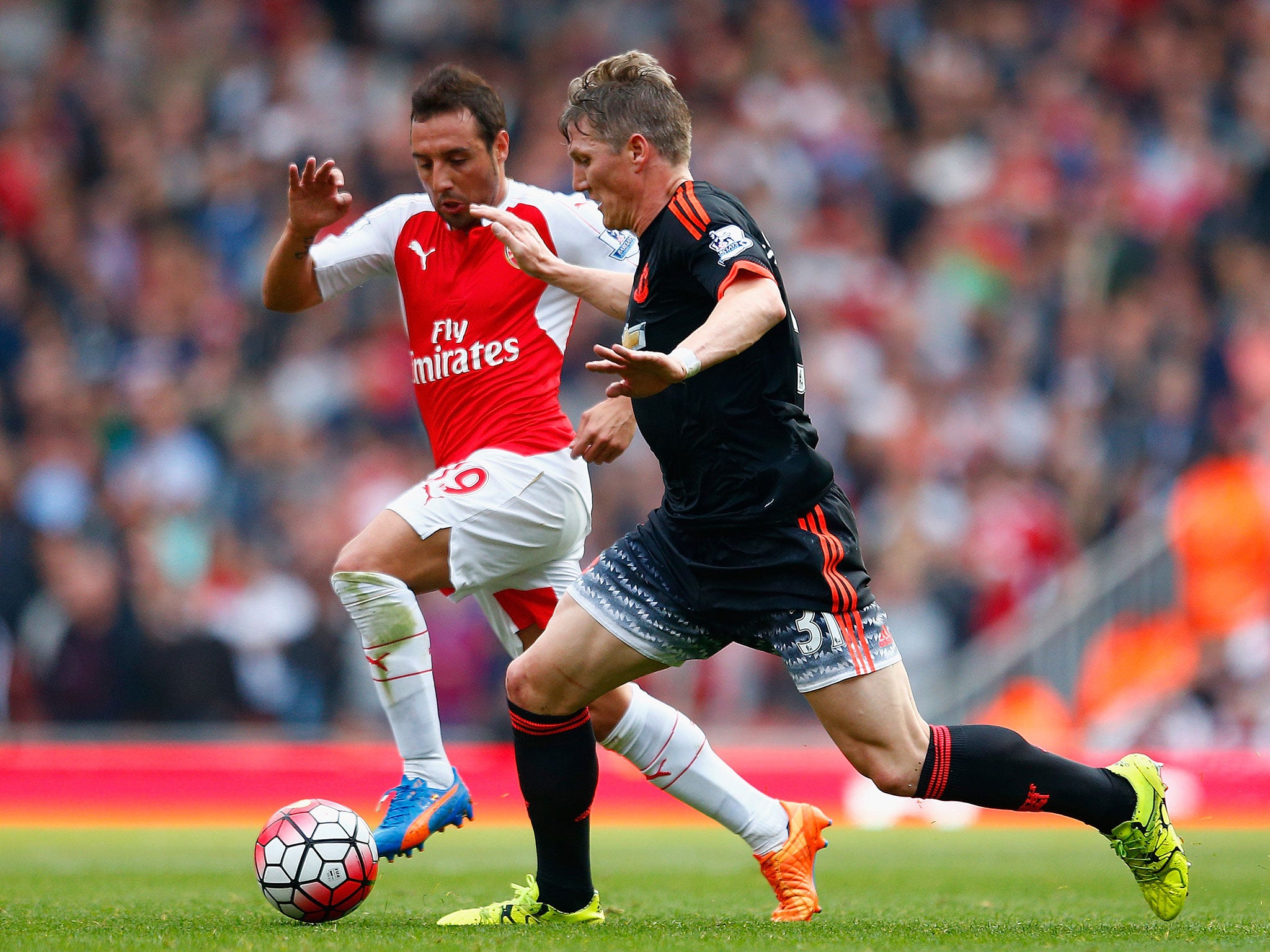 Santi Cazorla (left) in action for Arsenal