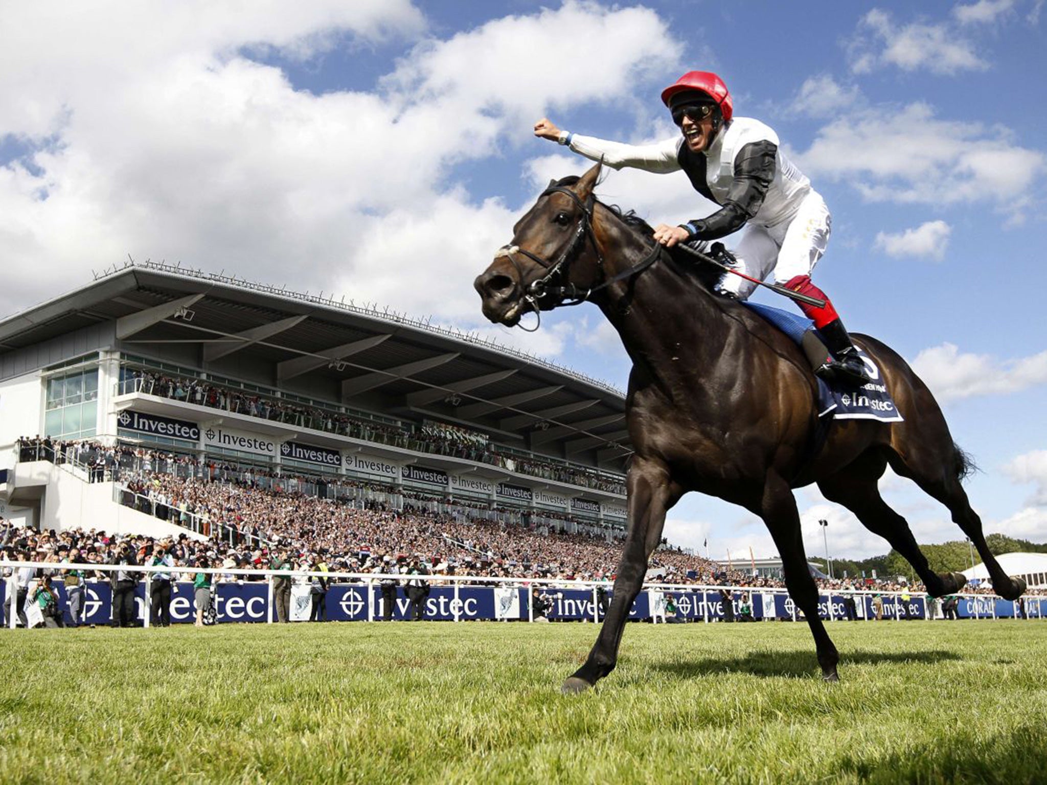 Frankie Dettori celebrates his Arc de Triomphe win at Longchamp aboard Golden Horn