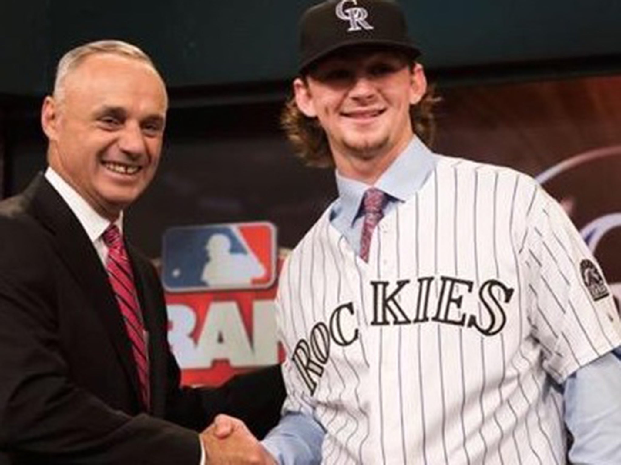 Colorado Rockies' Brendan Rodgers (right)