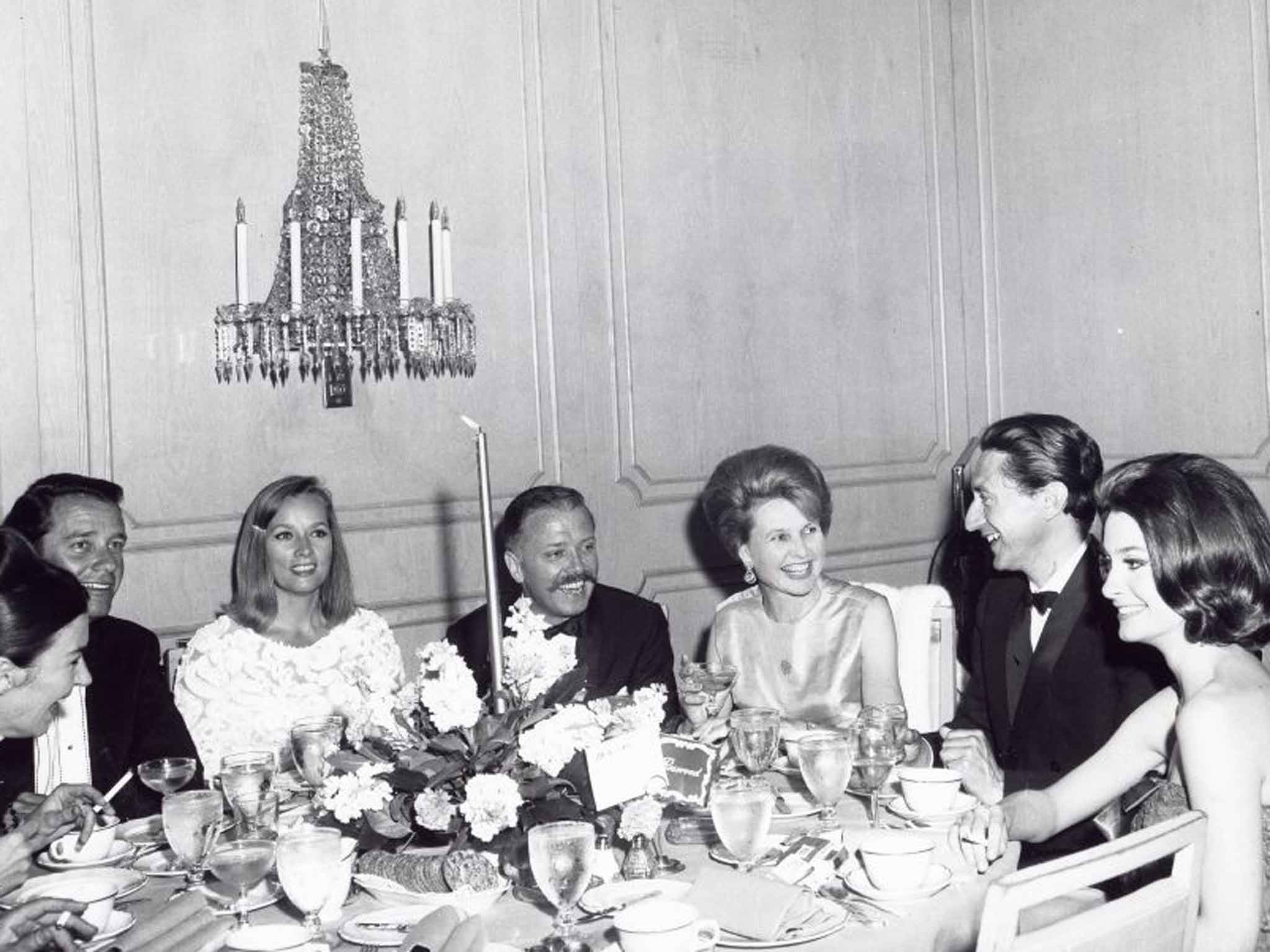 At the premiere for Guillermin's 1966 film 'The Blue Max', left to right, Richard Attenborough and his wife Sheila Sim, Guillermin and Elizabeth Ashley, wife of the film's star, George Peppard