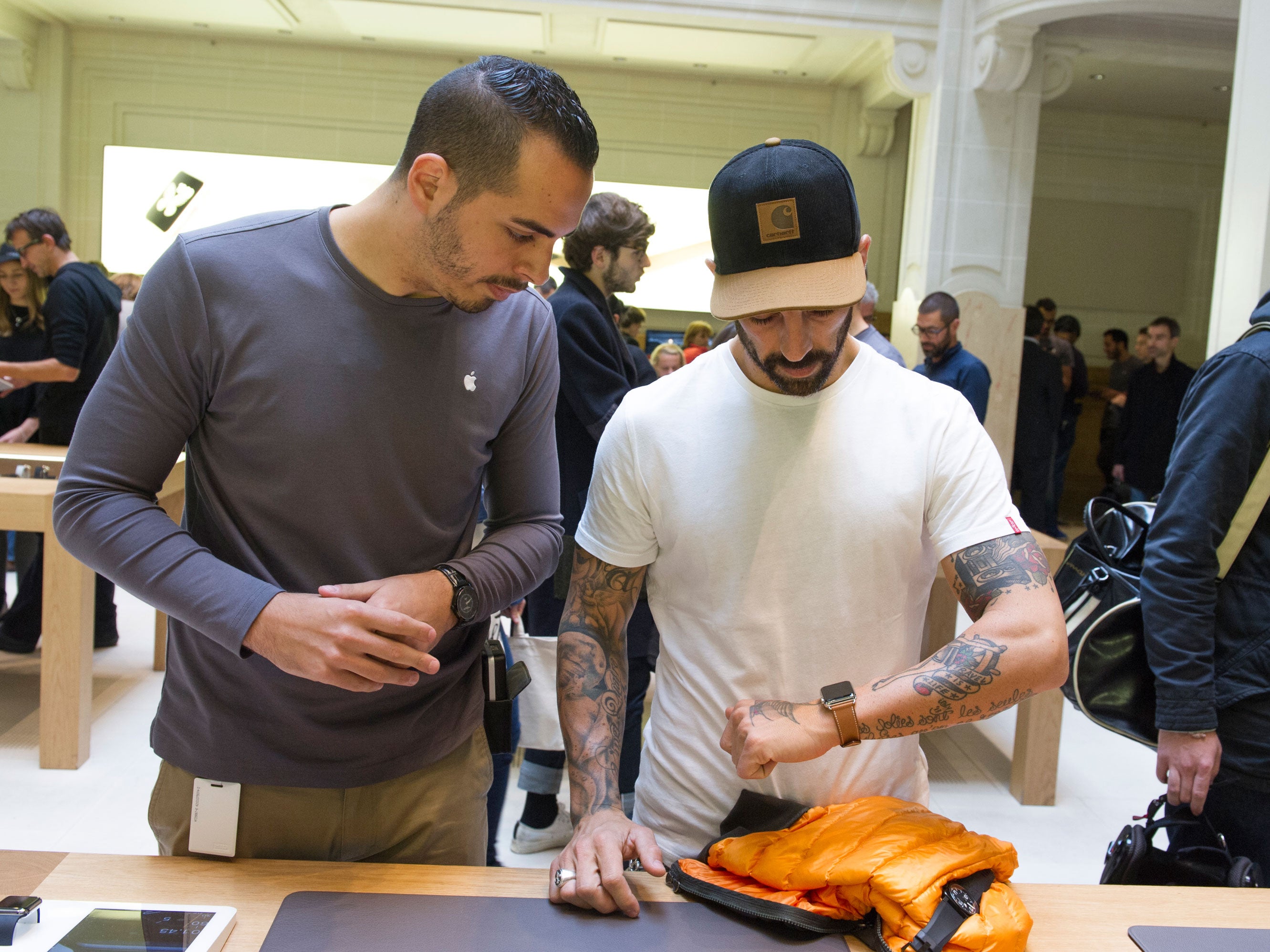 A customer tries the new Watch at the Apple Store, Opéra in Paris