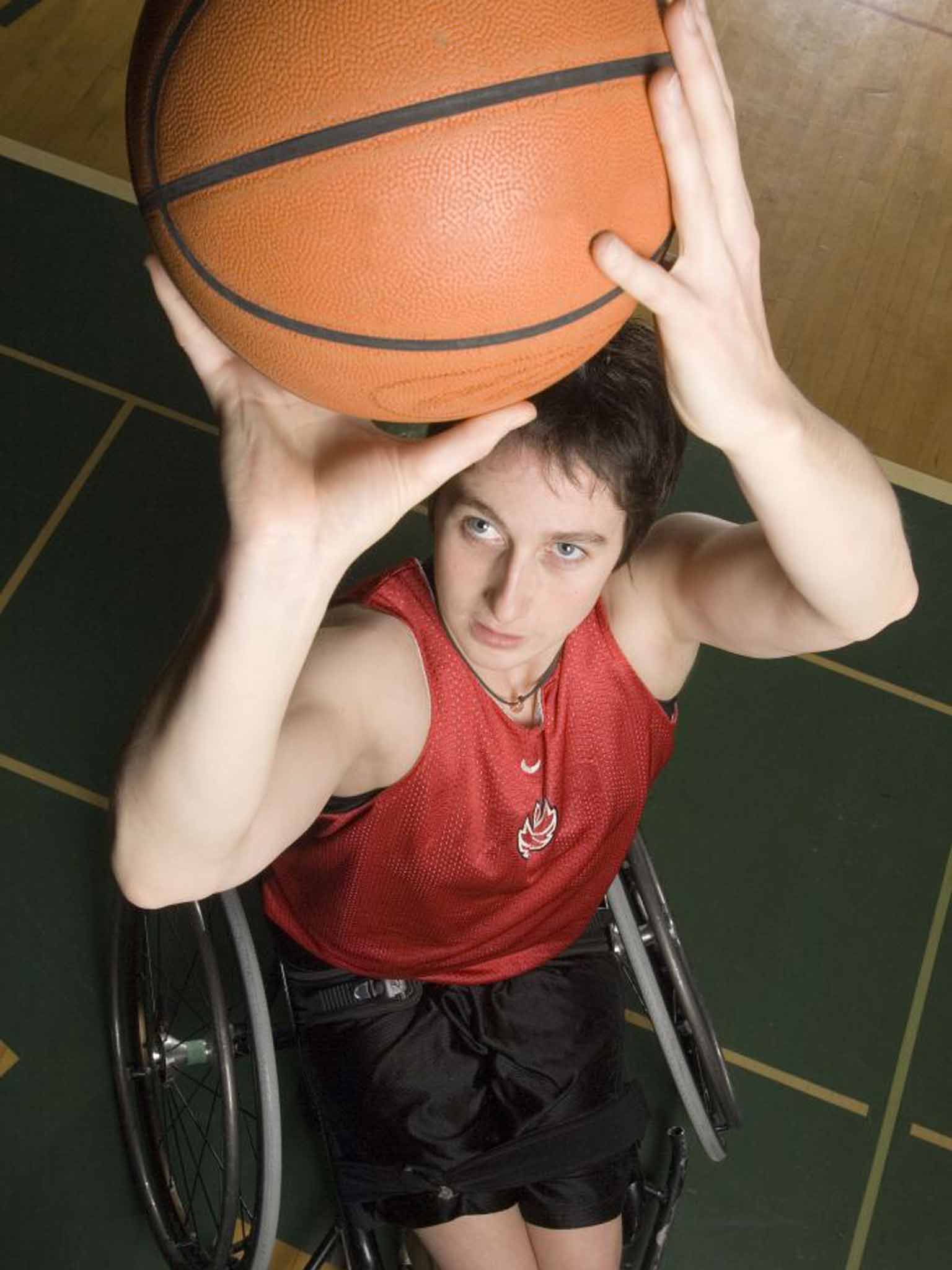 New ball game: Danielle Peers shoots hoops from the chair that she now needs