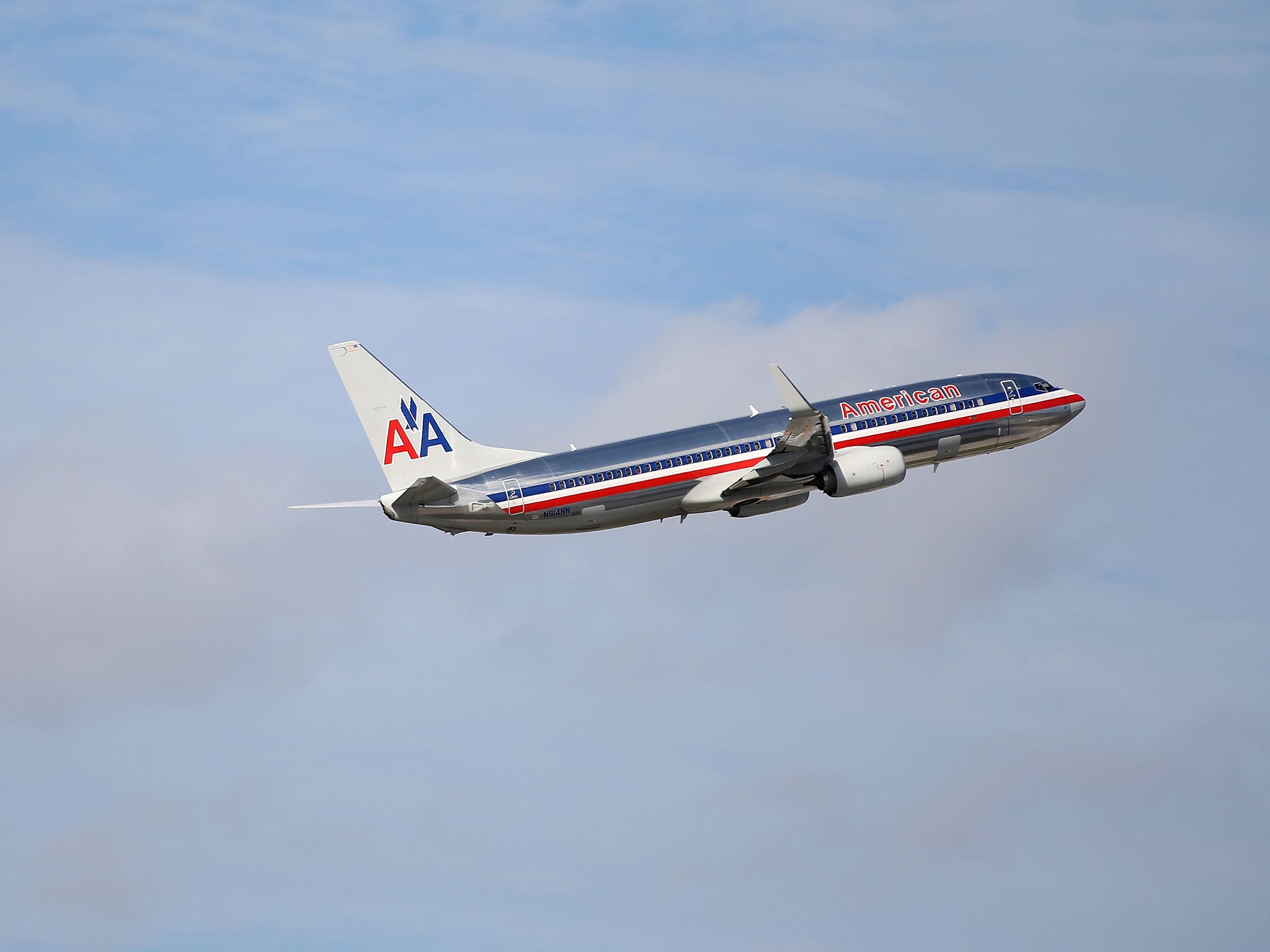 An American Airlines pilot has died after falling ill during a flight