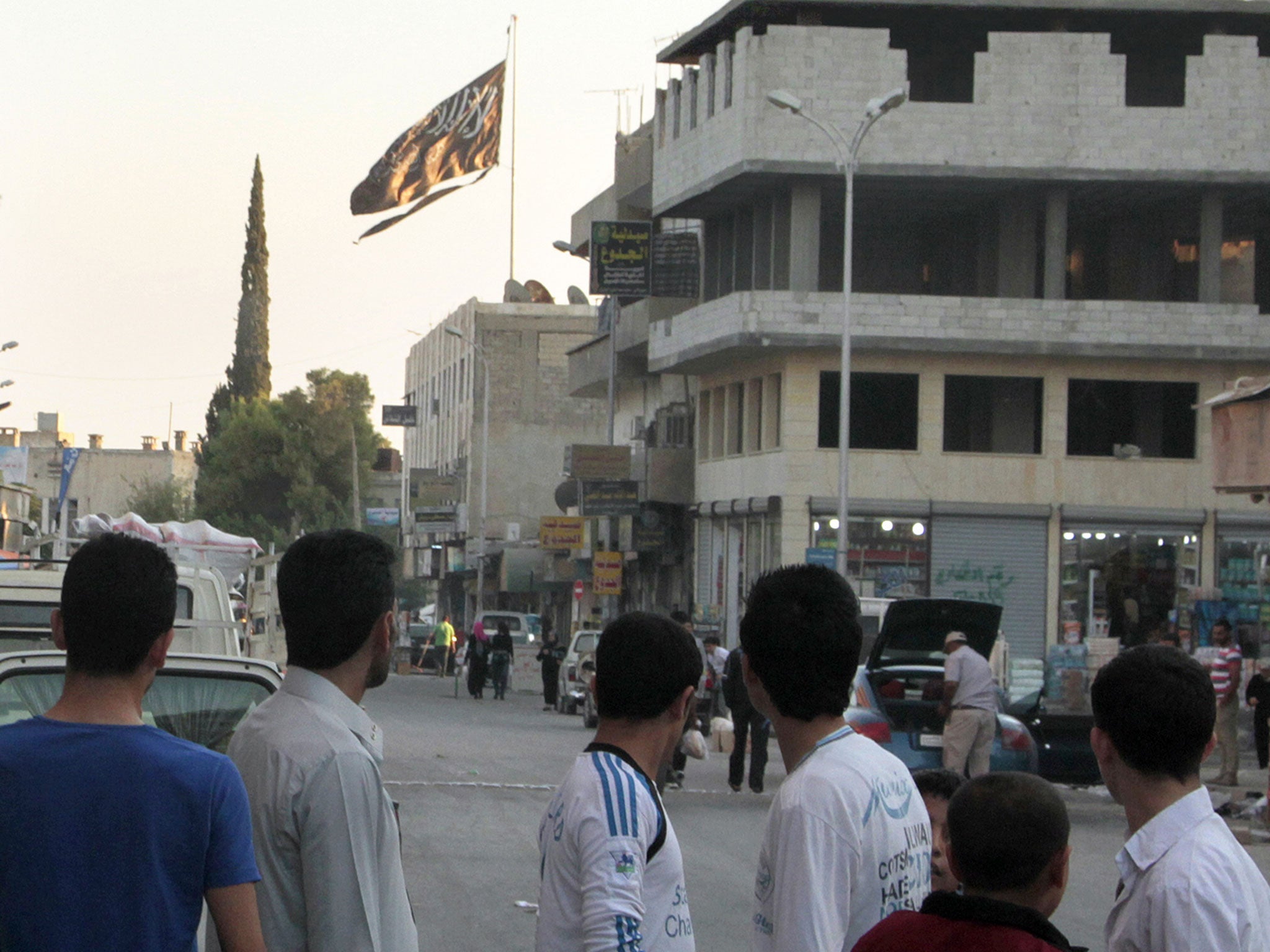 &#13;
The Isis flag flying in Raqqa&#13;