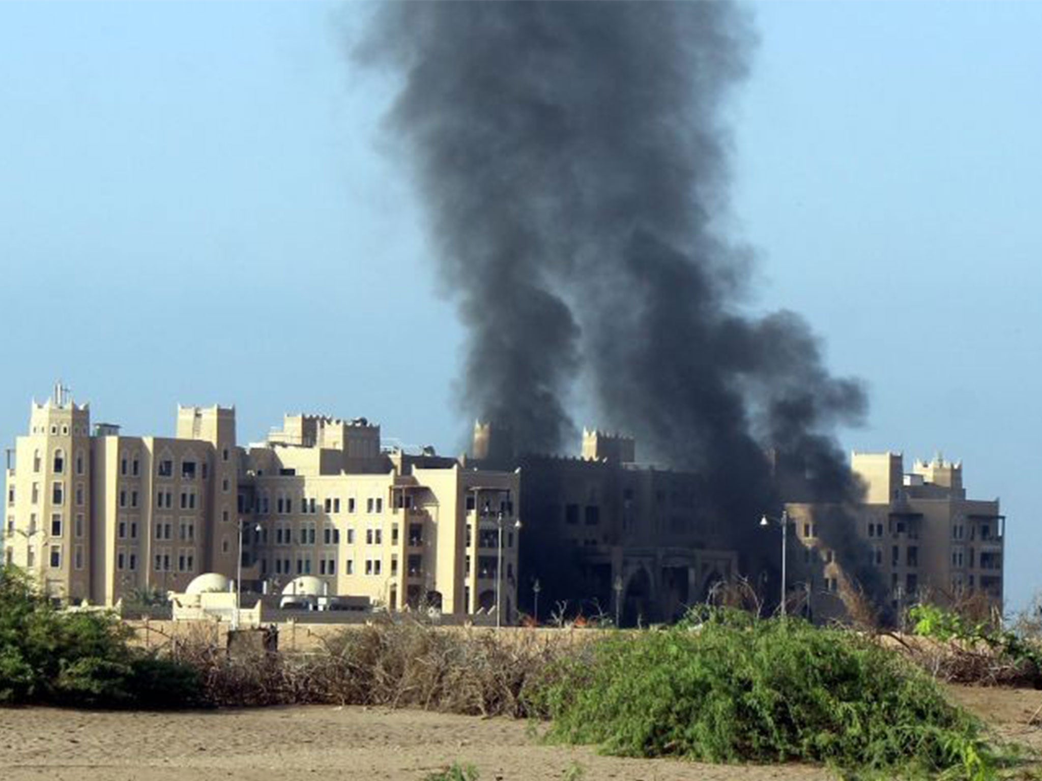 The Al-Qasr Hotel after it was hit by rockets