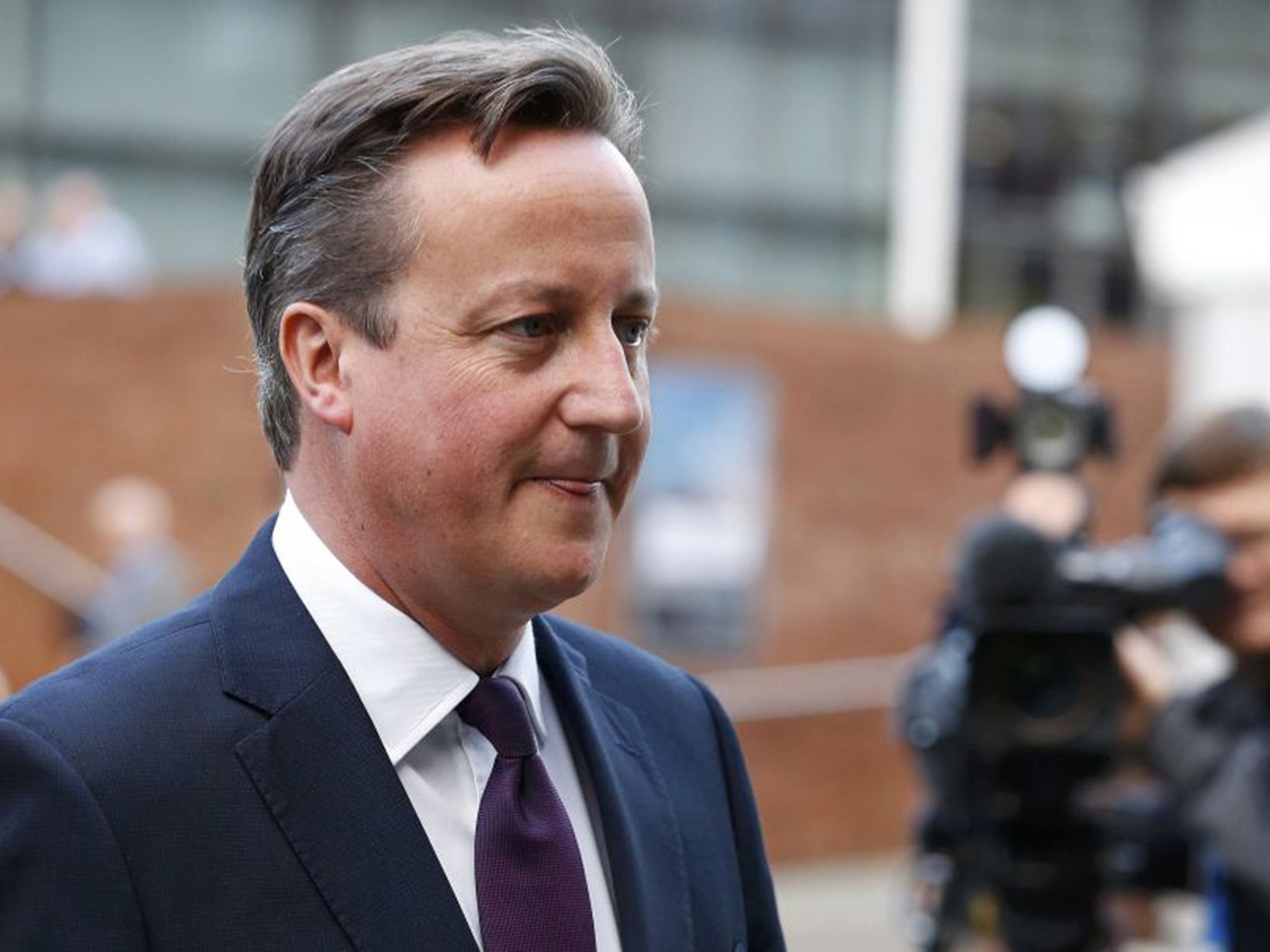David Cameron arrives at the Conservative Party conference in Manchester