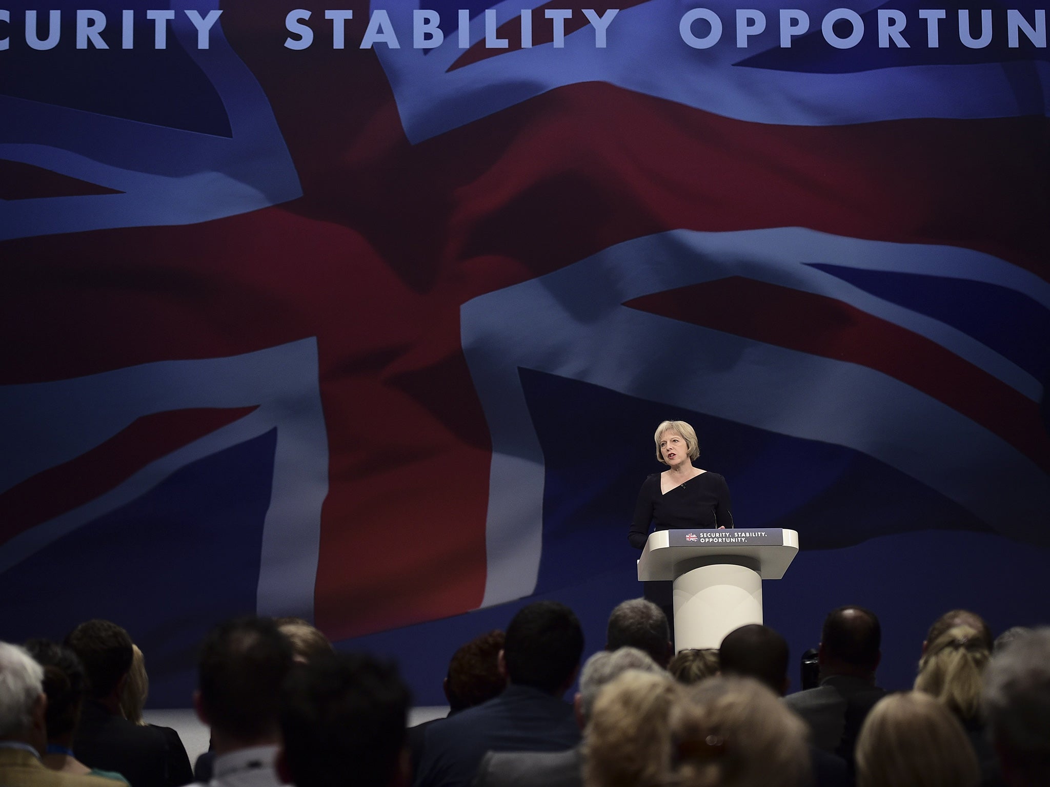 Home Secretary Theresa May gives a speech on the third day of the annual Conservative party conference in Manchester,