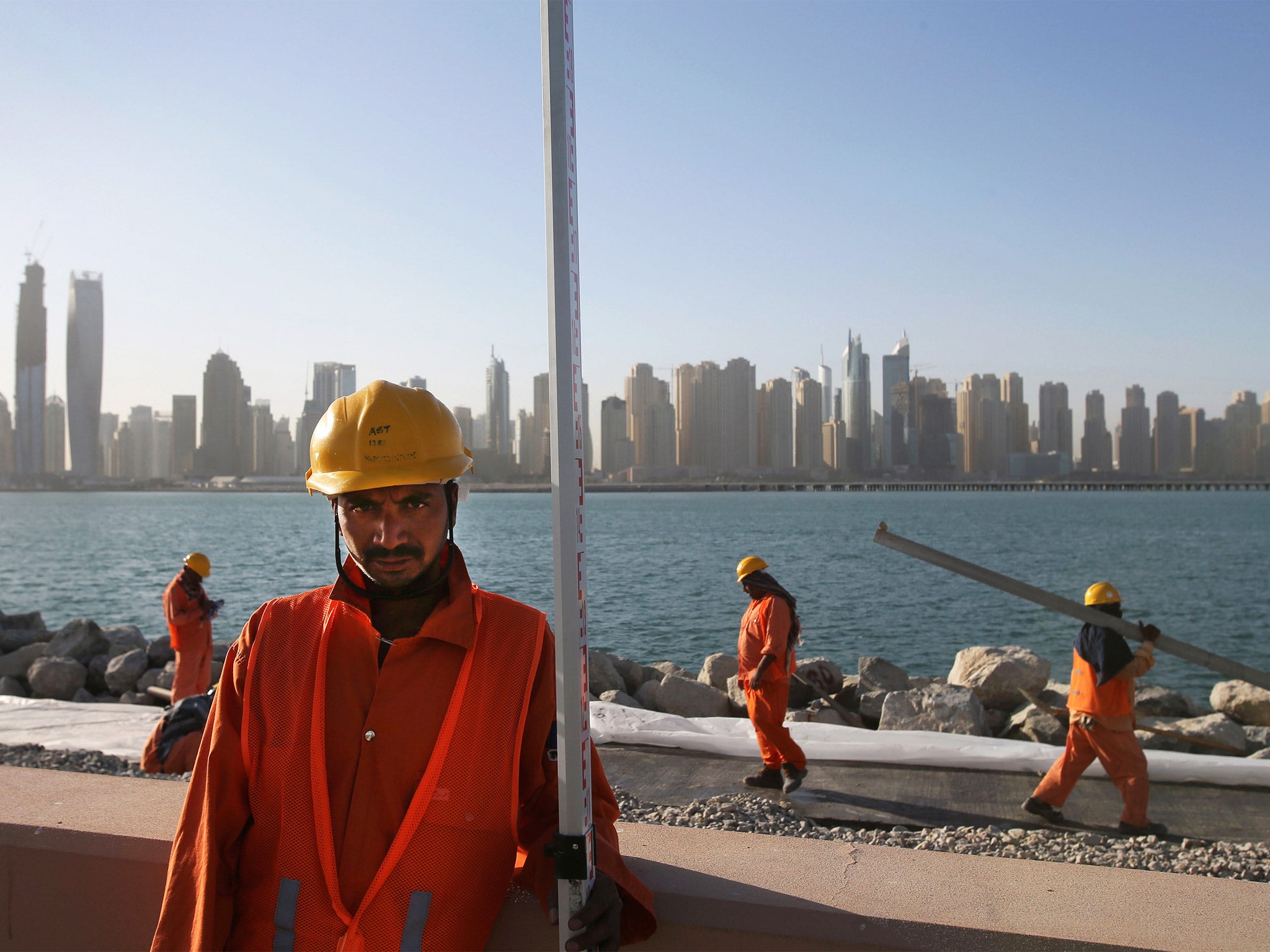 Builders at work on a construction site in Dubai