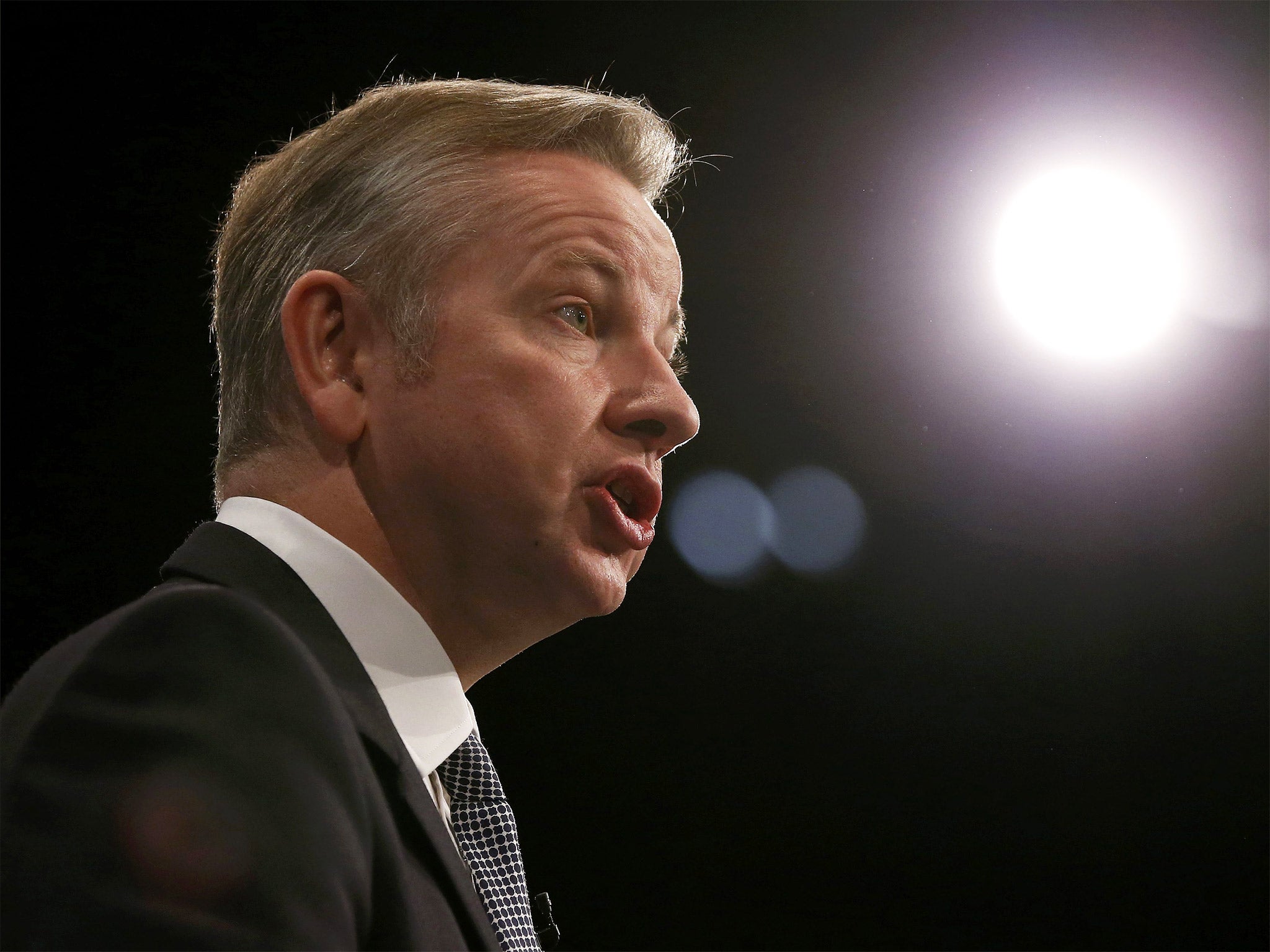 Justice Secretary Michael Gove addresses delegates at the Conservative Party conference