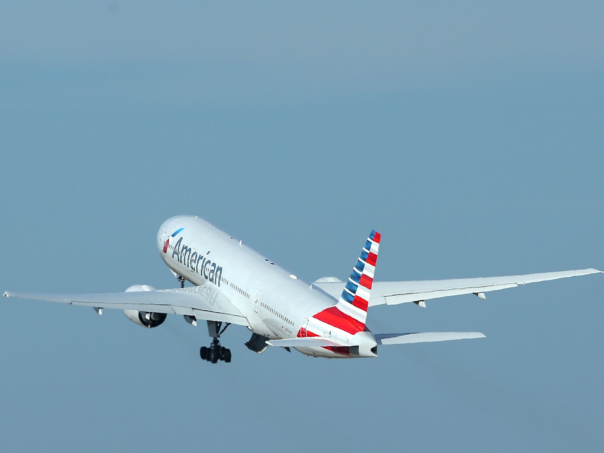 The men were flying American from New York to Toronto