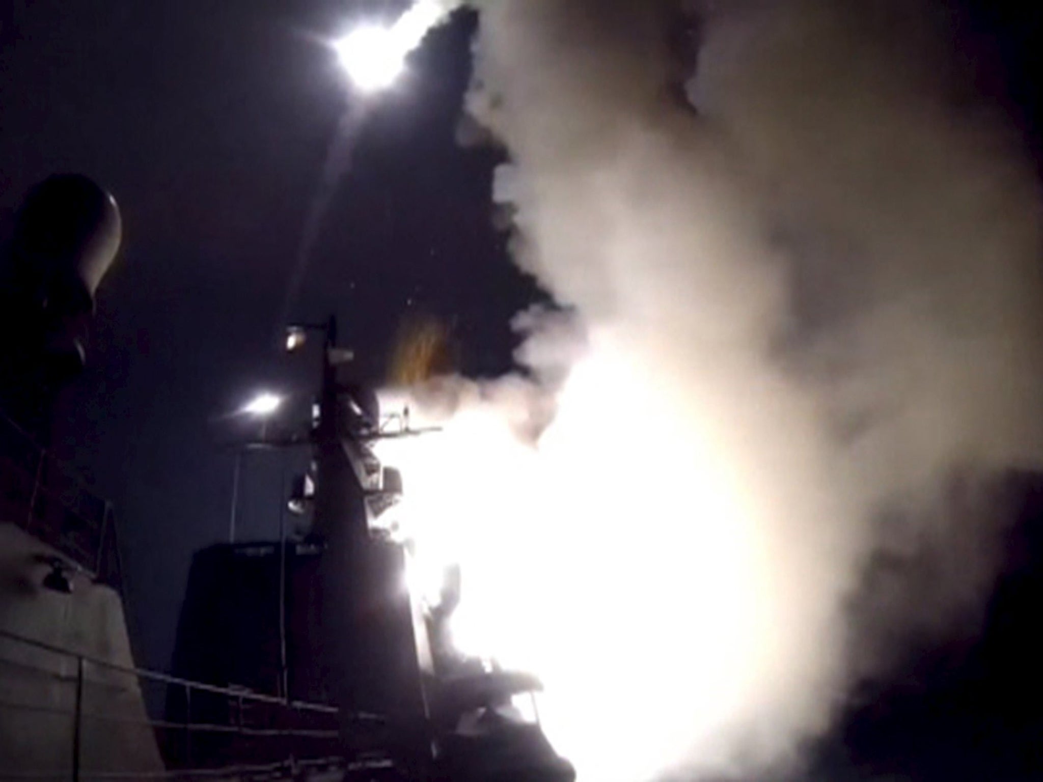 A Russian warship is seen firing rockets in the Caspian Sea in this frame grab taken from footage released by Russia's Defence Ministry