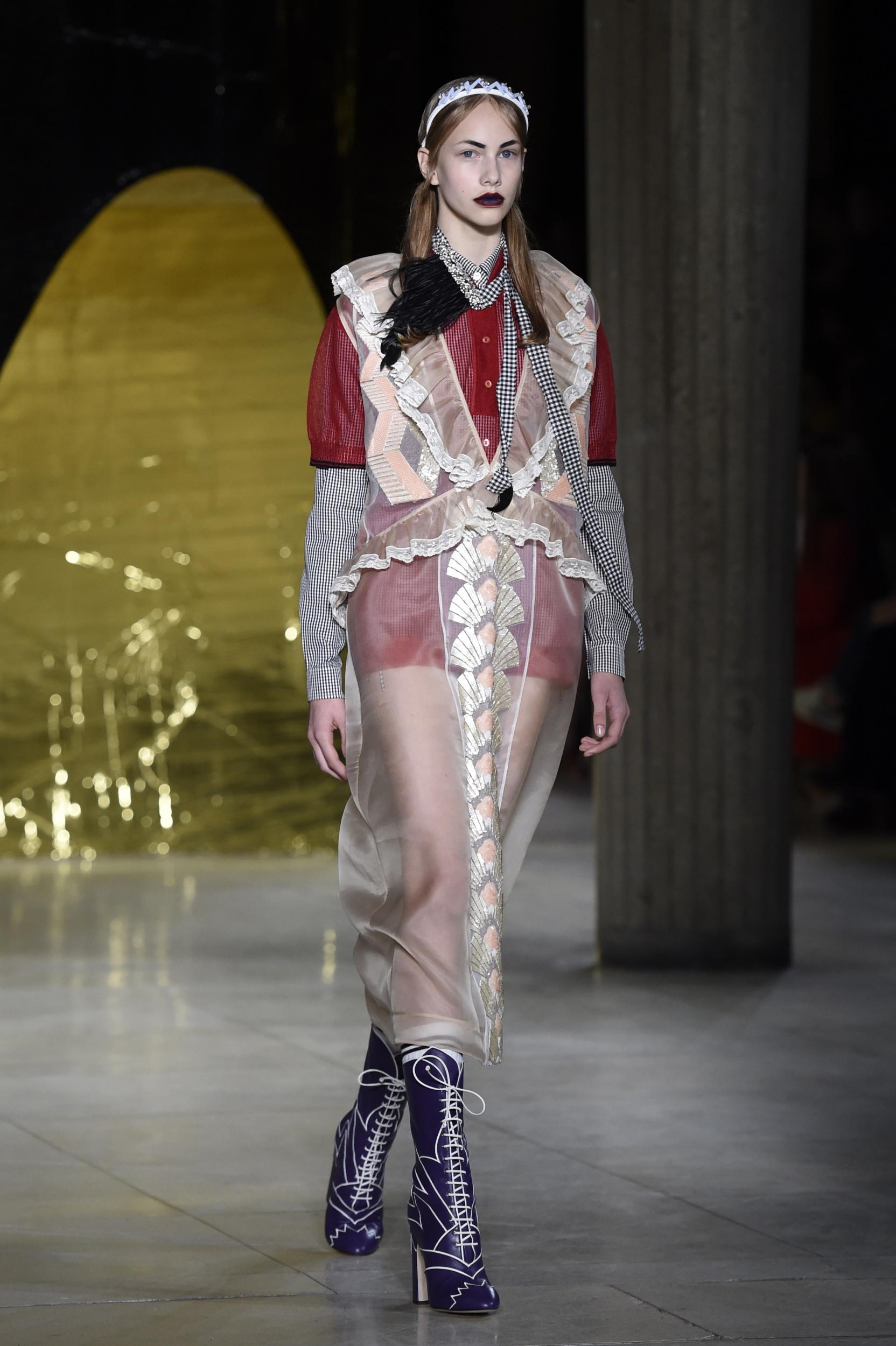 A model presents a creation for Miu Miu during the 2016 Spring/Summer ready-to-wear collection fashion show, on October 7, 2015 in Paris. MIGUEL MEDINA/AFP/Getty Images