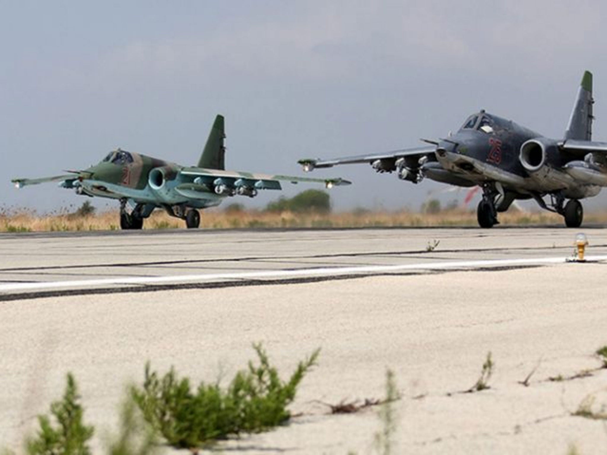 Russian SU-25 strike fighters taking off from the Syrian Hmeymim airbase, outside Latakia, Syria.