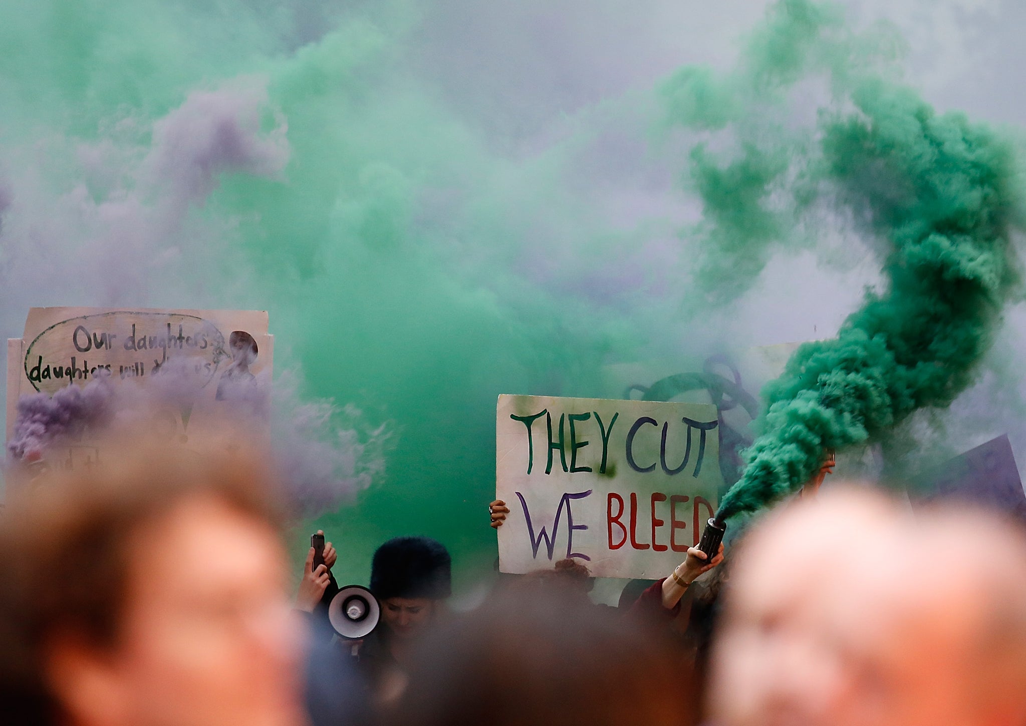 Activists protest the Suffragette Premiere during the Opening Night Gala during the BFI London Film Festival at Leicester Square on October 7, 2015 in London