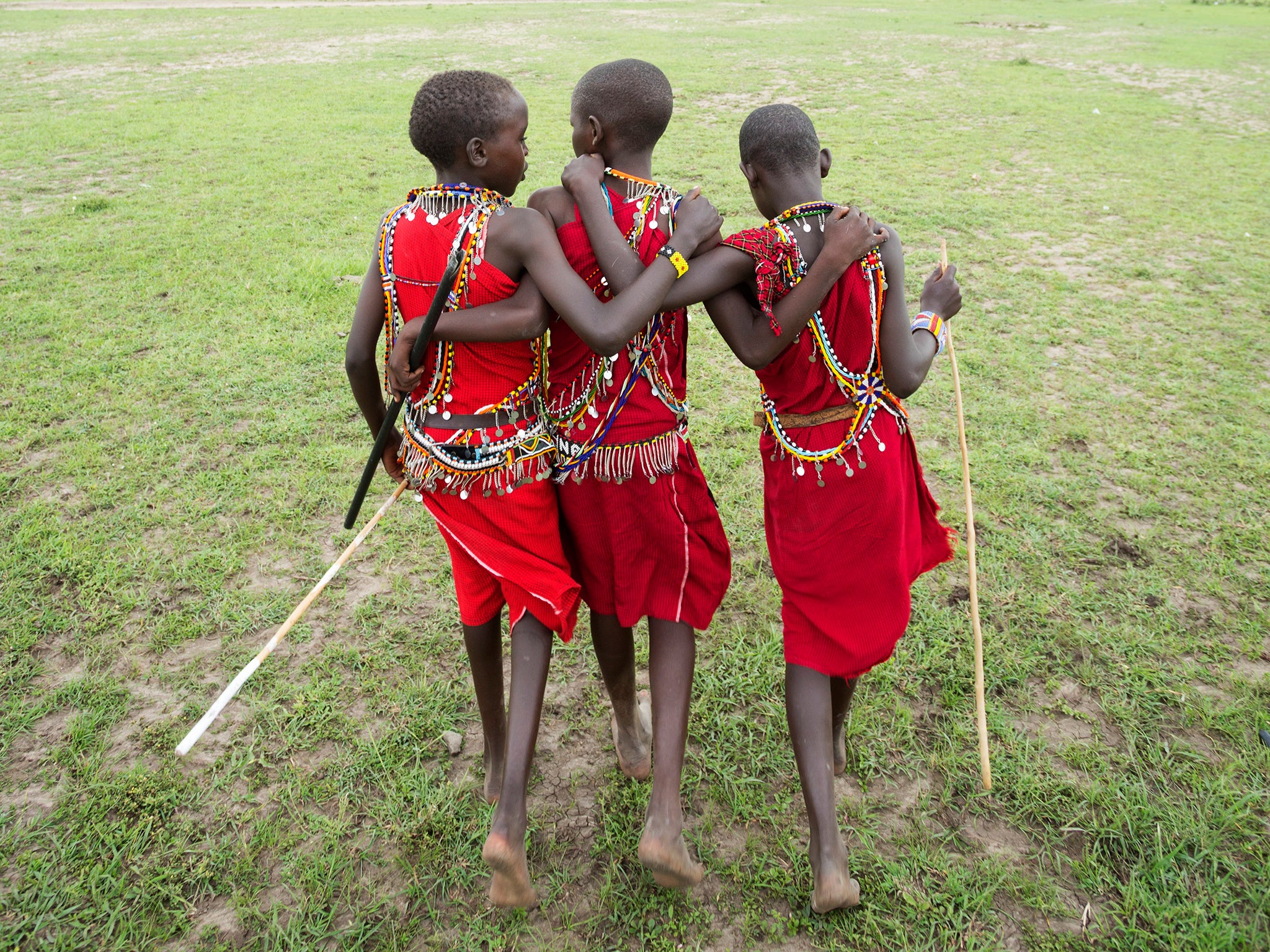 Kenyan Maasai school children in traditional costume. East African people owe up to a quarter of their DNA to ancient Asians and Europeans who migrated into the region