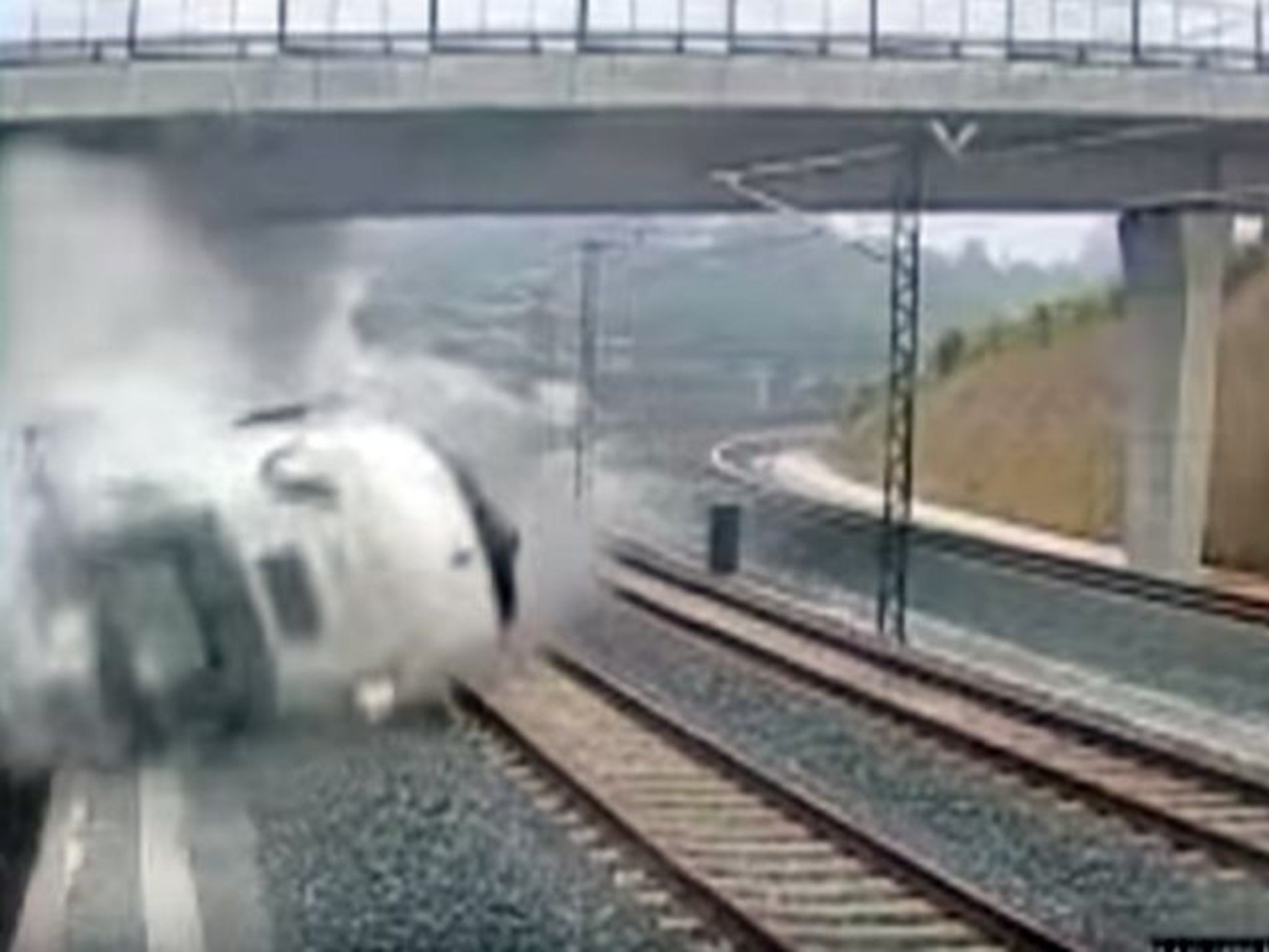 Security video captures the sequence of events as the train leaves the tracks near Santiago de Compostela in July 2013