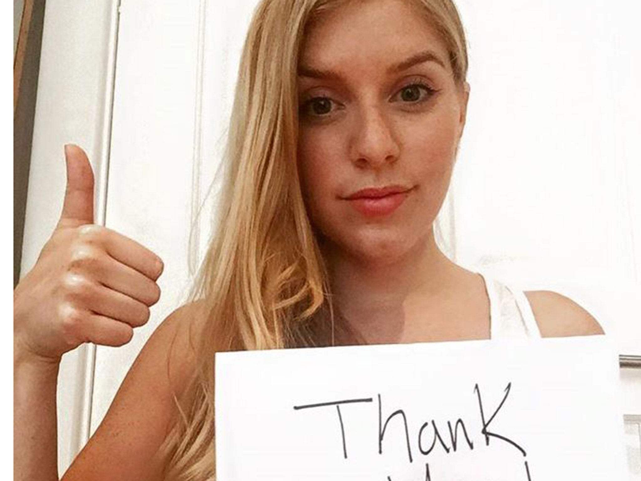 Ms Regehr posted this picture thanking the stranger who came to her aid and took a stand against harassment in a written post and accompanying picture