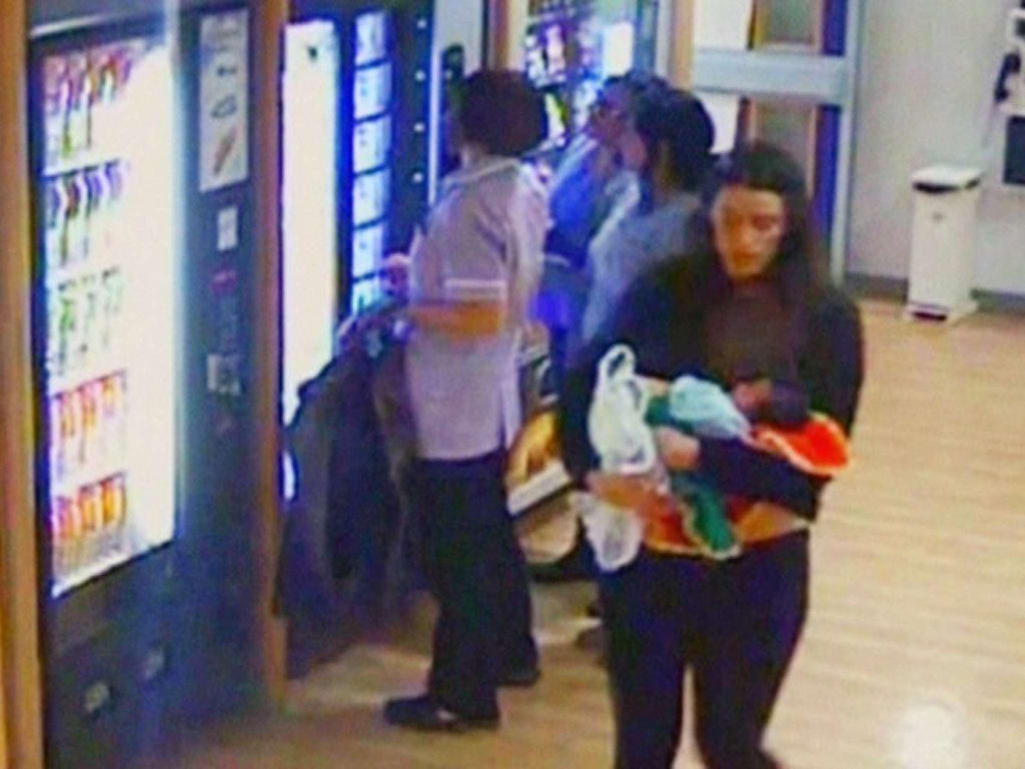 Hospital CCTV picture shows new mum Charlotte Bevan leaving hospital with baby Zaani, before she took her own life and that of Zaani