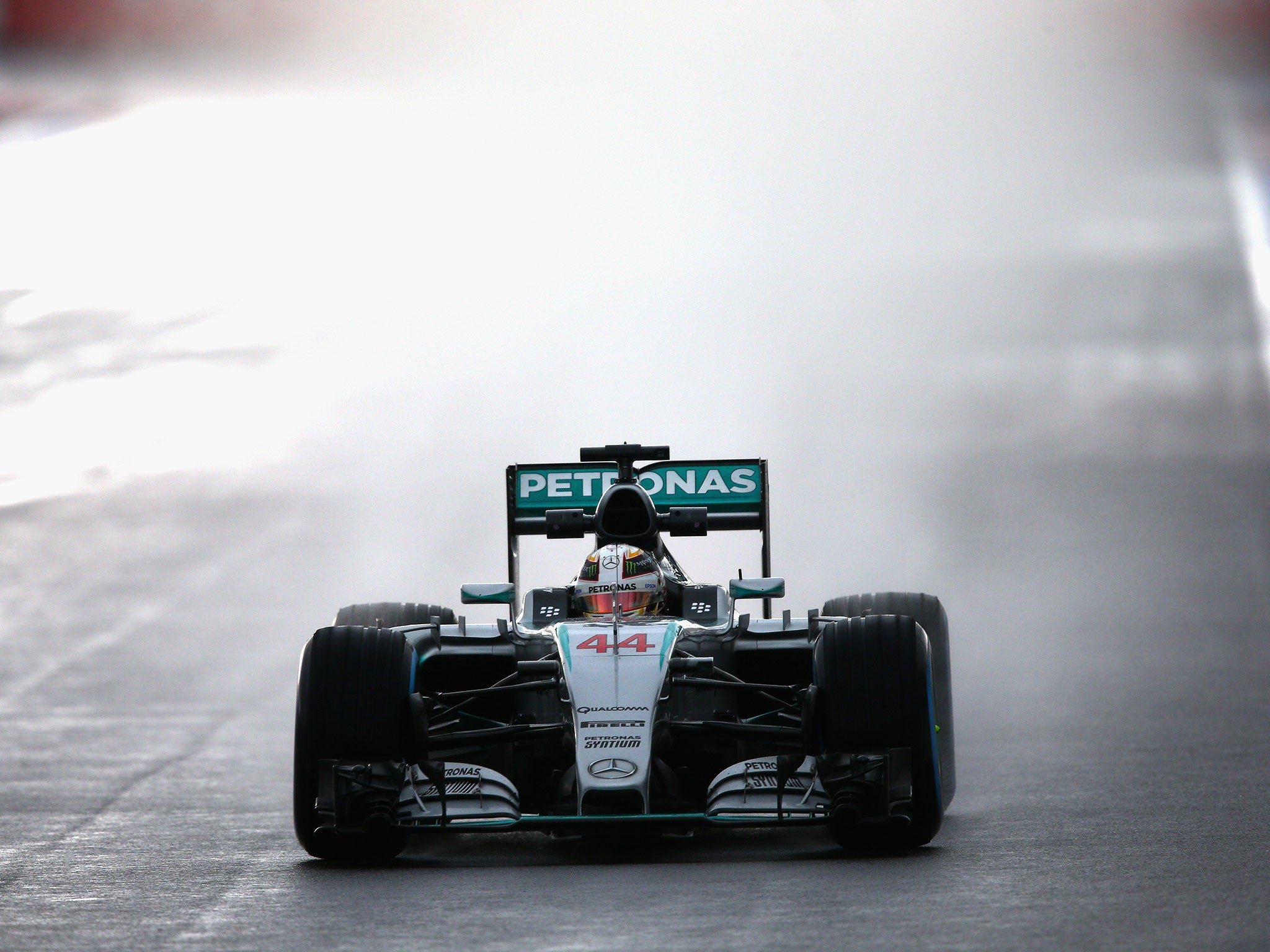 Lewis Hamilton negotiates the wet conditions during F1 practice