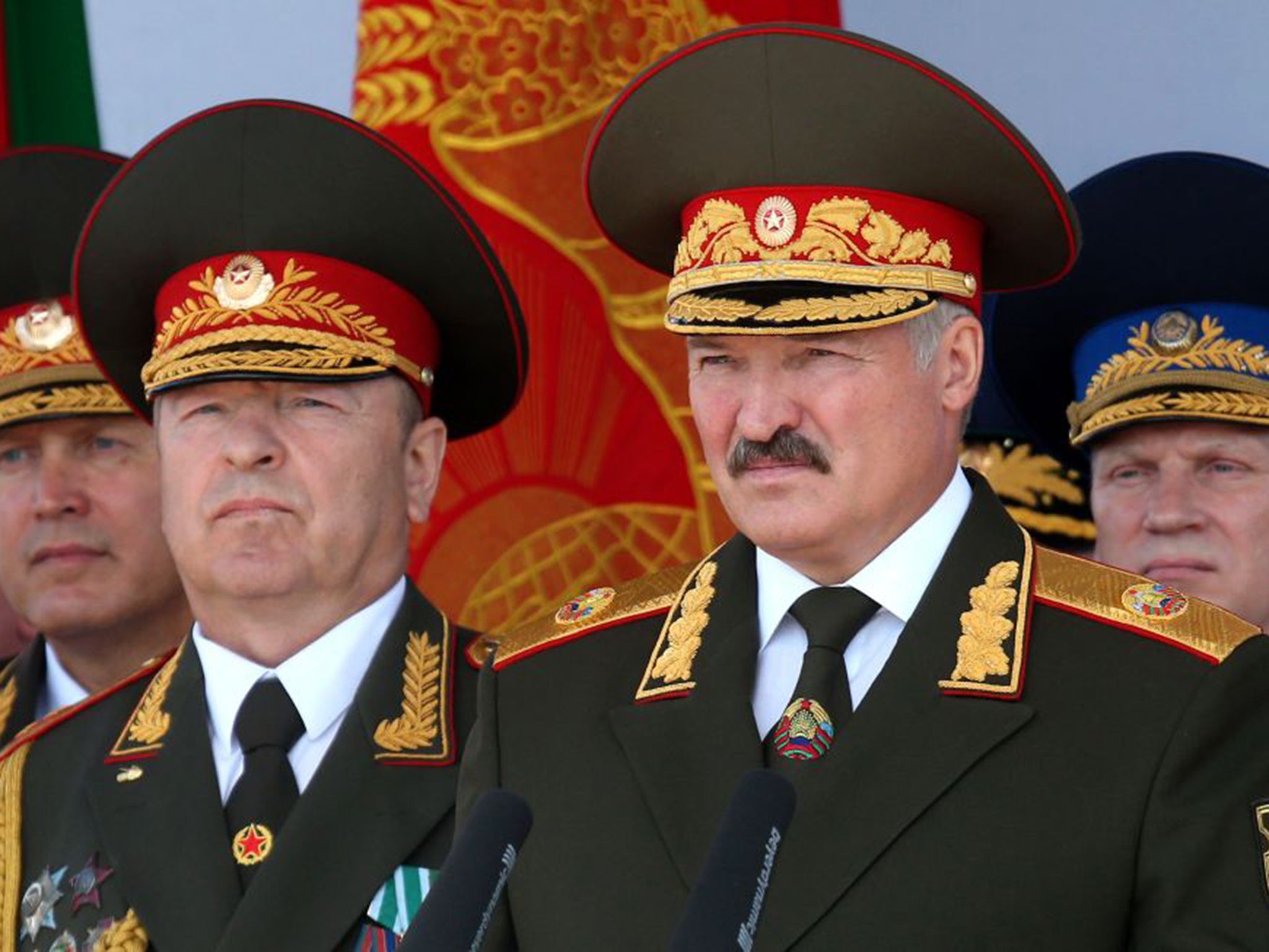 President for 21 years, Alexander Lukashenko, right, is the election favourite