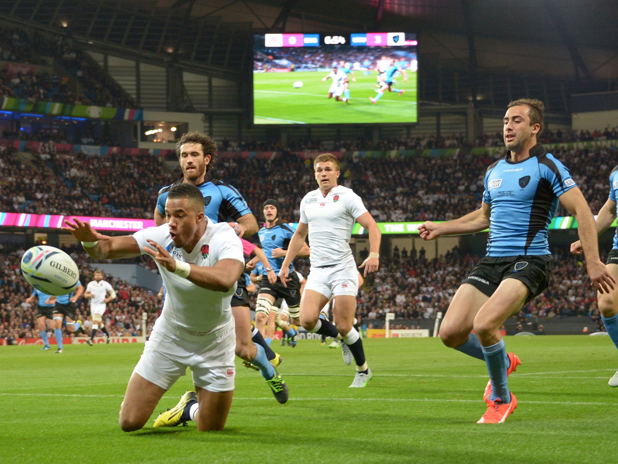 Anthony Watson scores an try for England against Uruguay