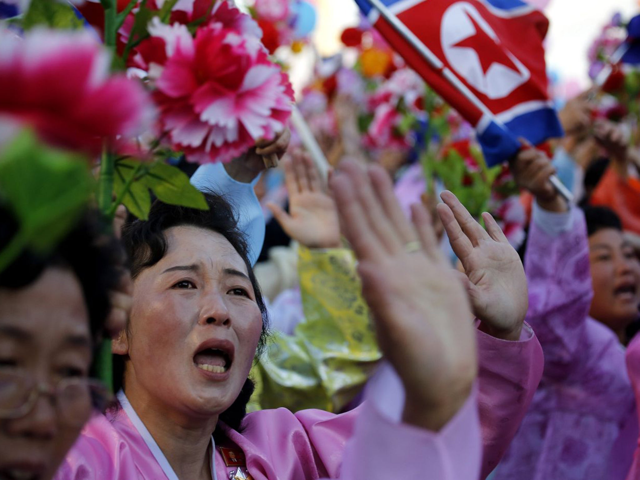 Weeping crowds lined the parade route in Pyongyang