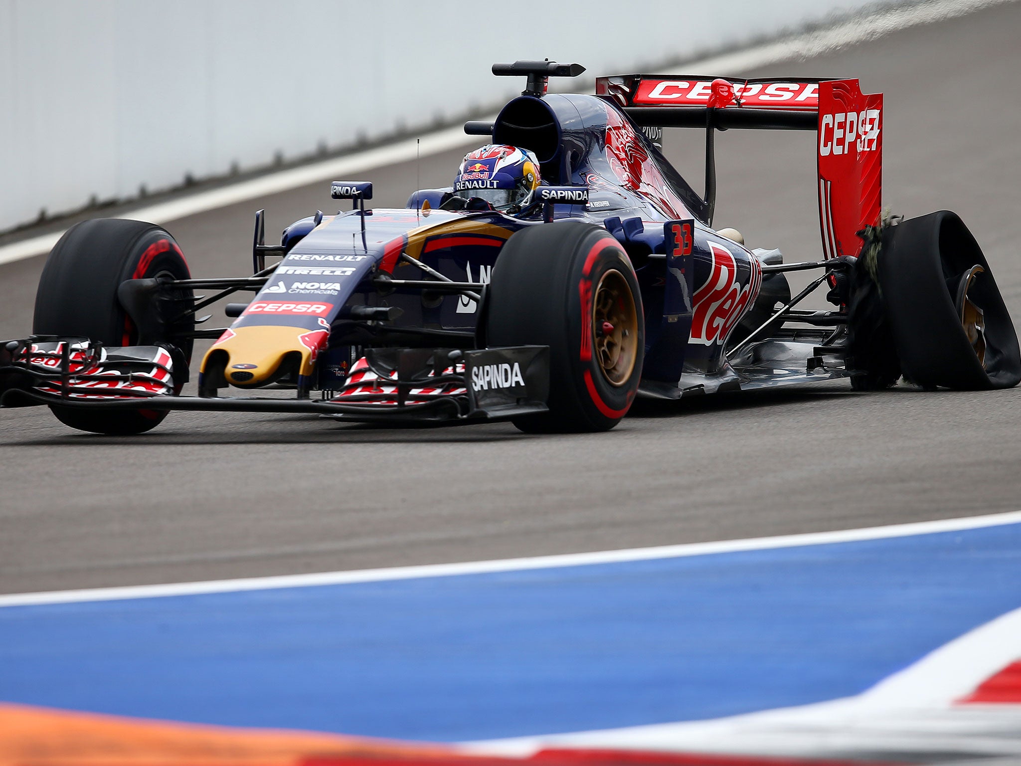 Max Verstappen suffers a left-rear puncture