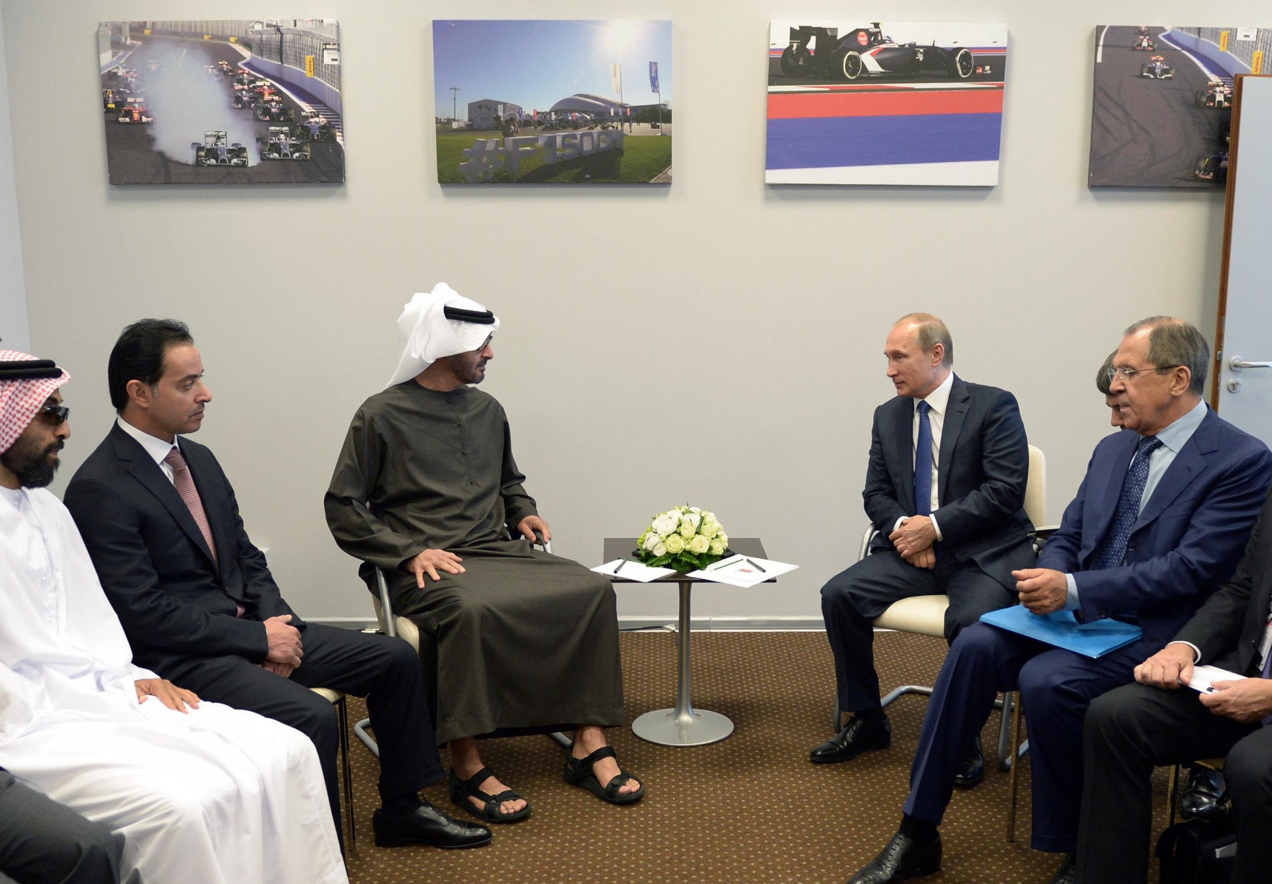 Russian President Vladimir Putin (2nd R) and Russian Foreign Minister Sergei Lavrov (R) meet with Crown Prince of Abu Dhabi and deputy supreme commander of the UAE Armed Forces Mohammed bin Zayed Al Nahyan