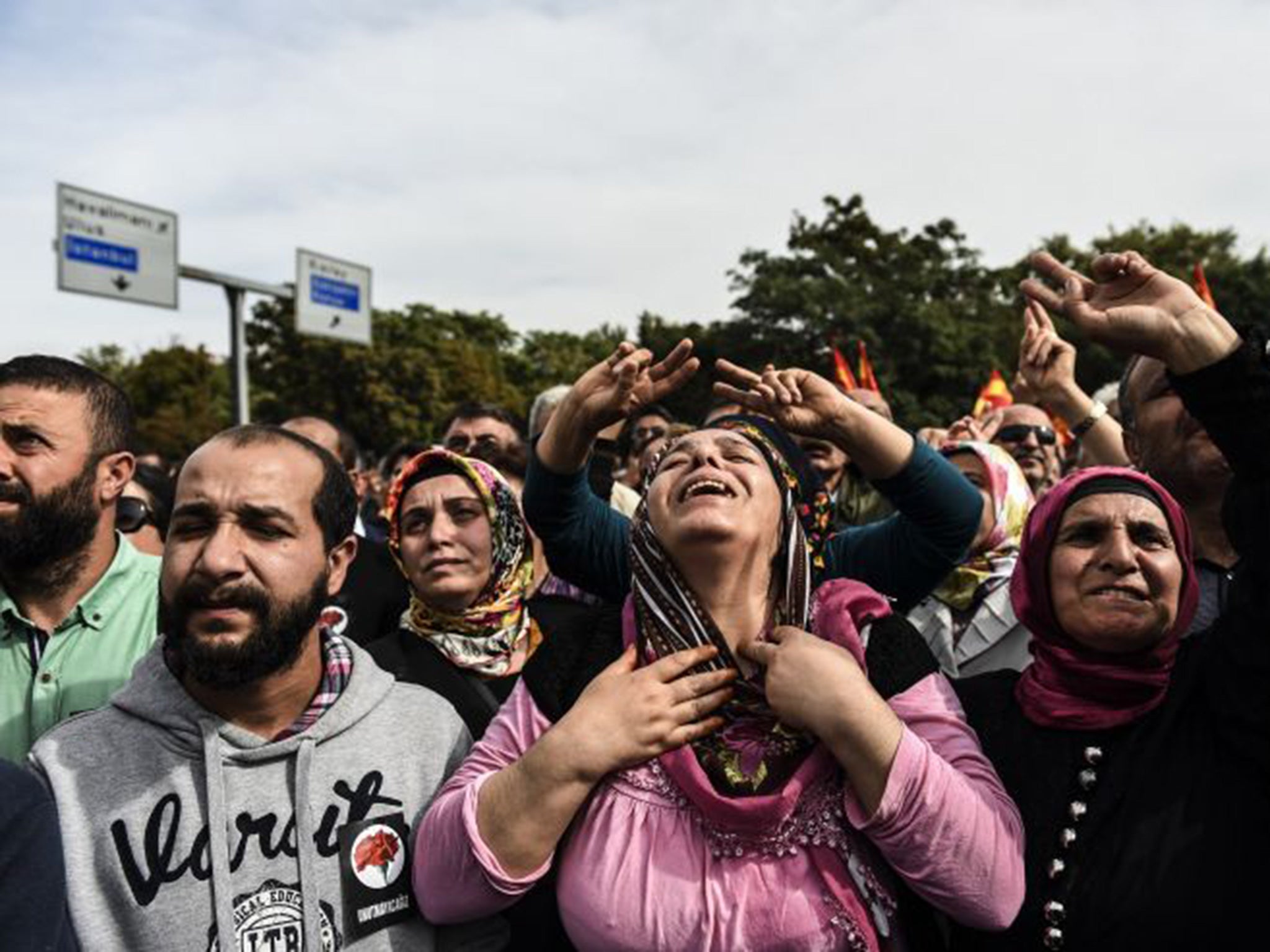 Protesters at the scene of the bombing in Ankara yesterday; they chanted ‘Murderer Erdogan’ and there were skirmishes with police