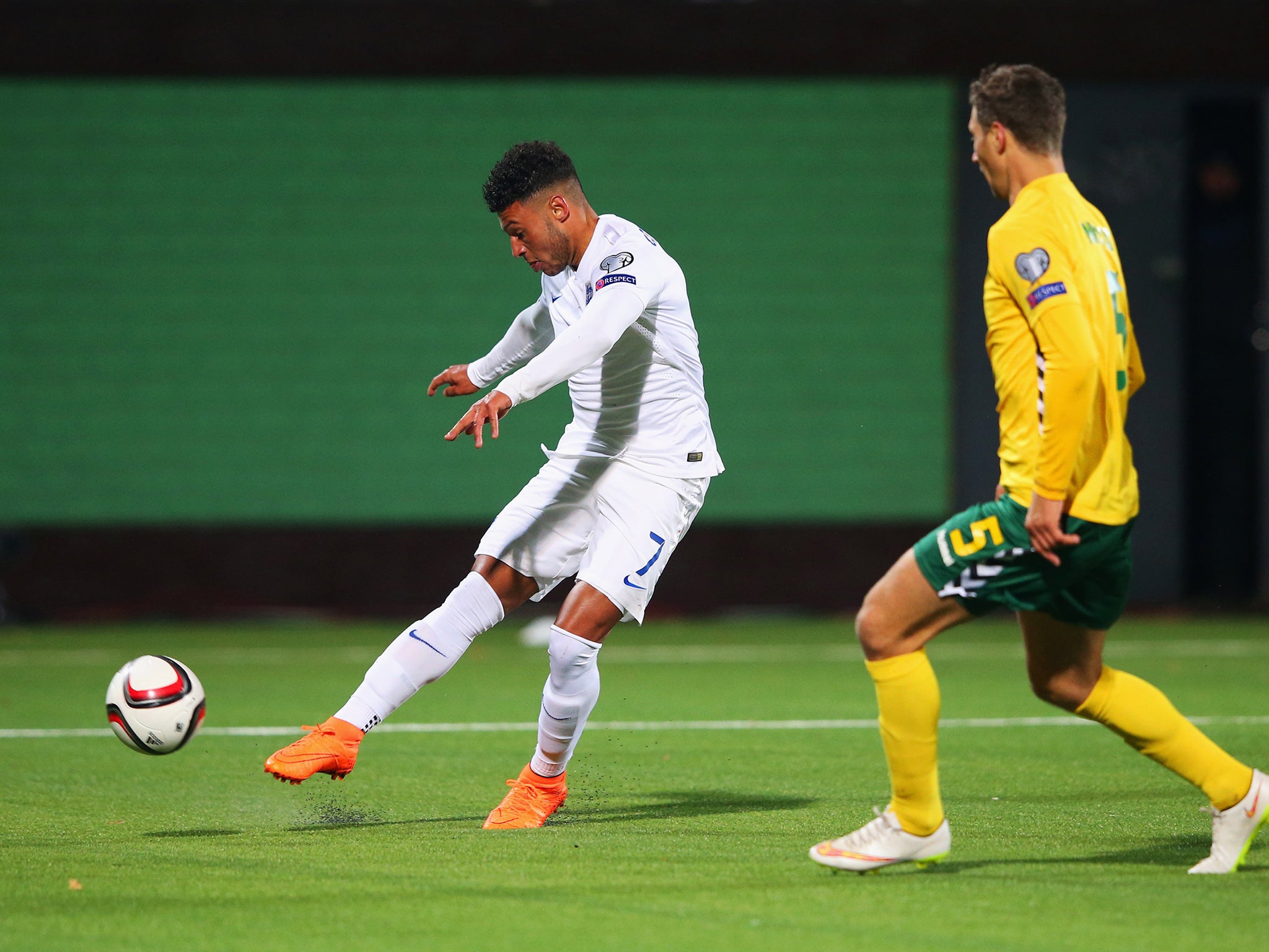 Alex Oxlade-Chamberlain scores England's third