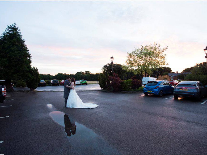 A puddle in a car park becomes the ideal photo prop. Chris Chambers Photography.