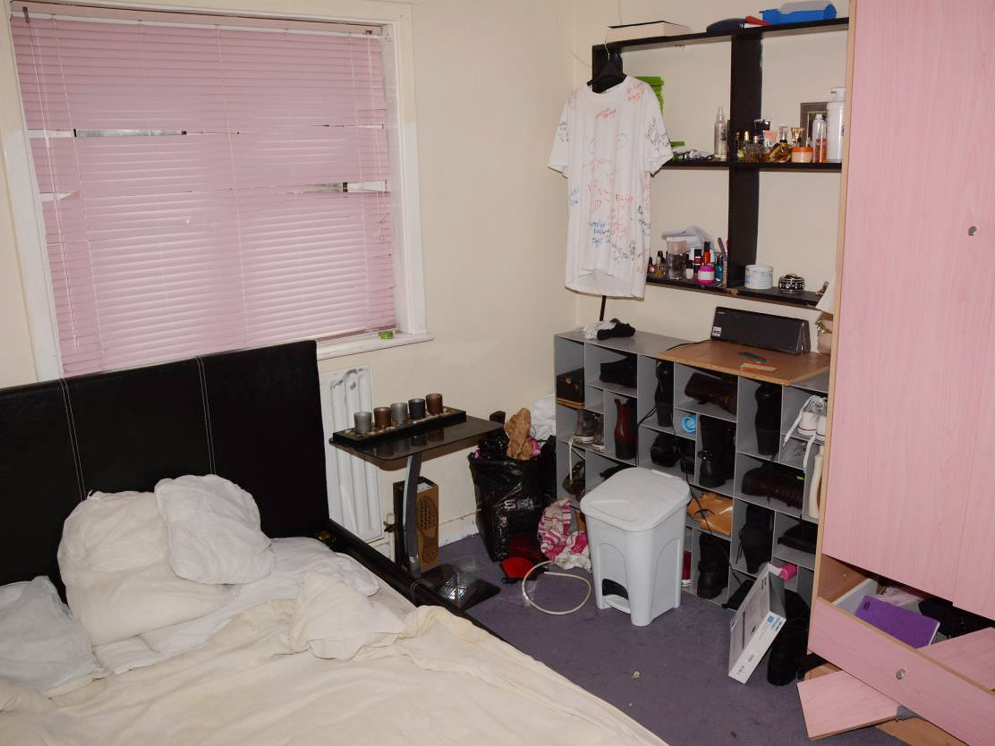 In Becky's home her bedroom has white walls, while her blinds and wardrobe are painted pink