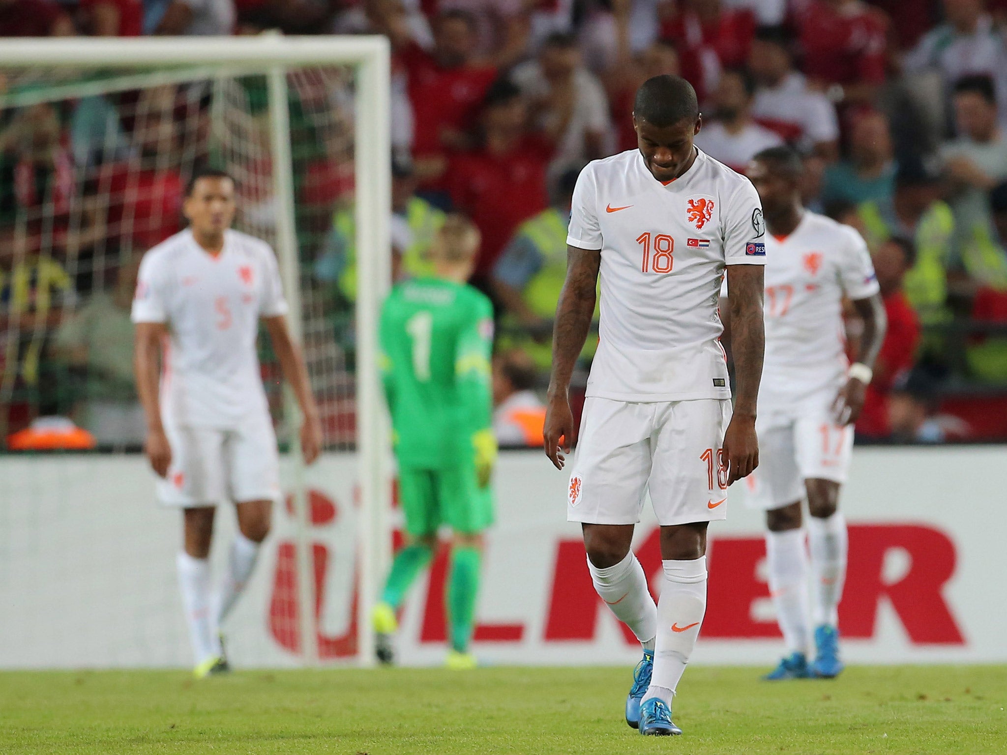 Georgino Wijnaldum hangs his head during last month's defeat to Turkey