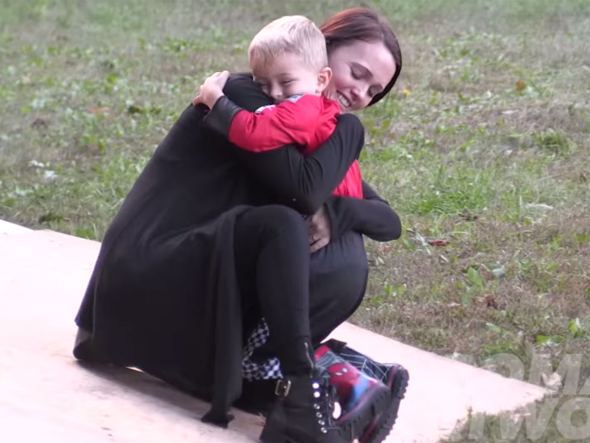 Brittney Smith holds the couple's son, Kane.