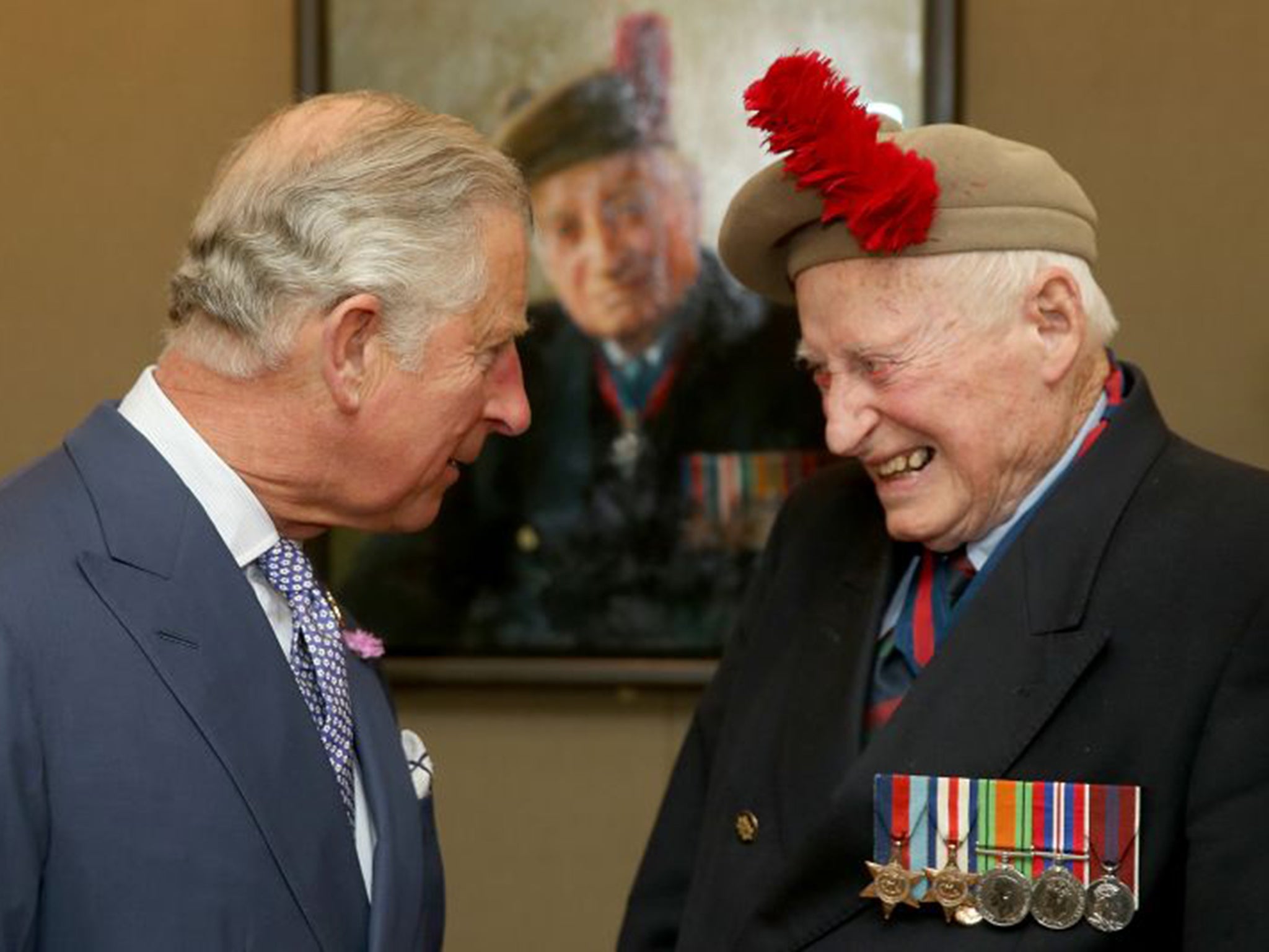 Stewart and Prince Charles in front of his portrait by Paul Benney at the D-Day Veterans exhibition ‘The Last Of The Tide’ at The Queen’s Gallery in London in June this year