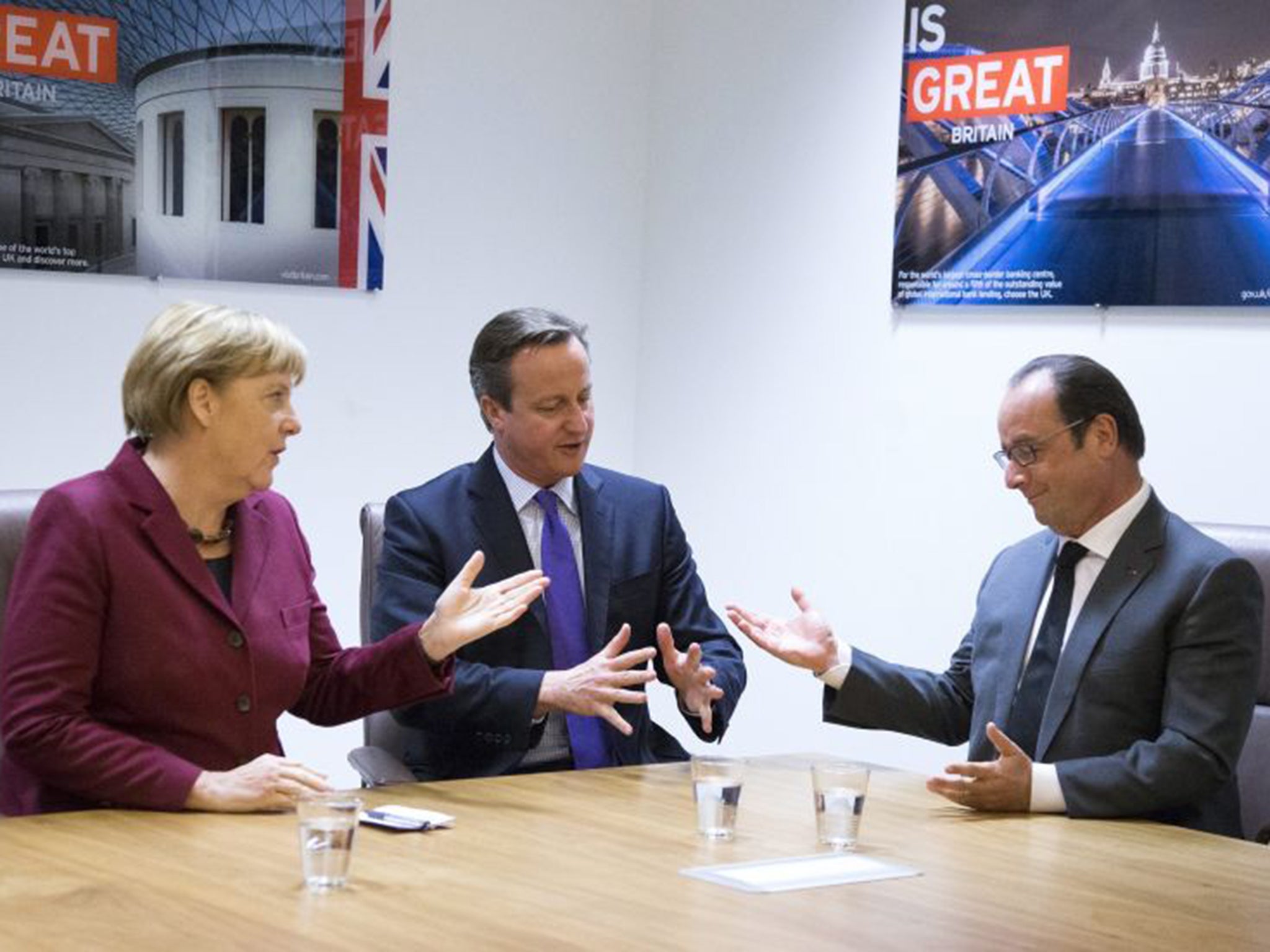 David Cameron with Angela Merkel and François Hollande in Brussels on Thursday