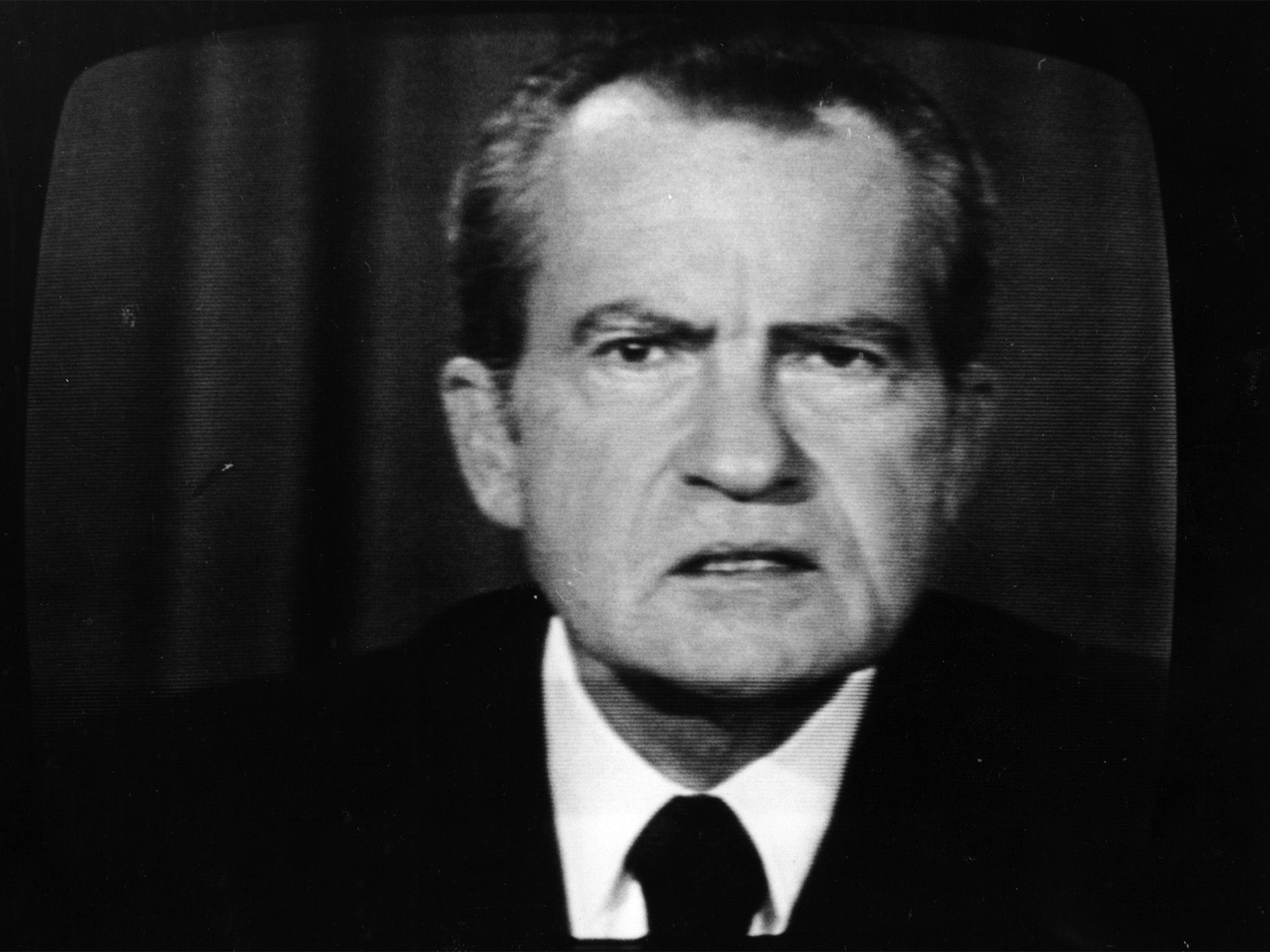 The 37th President of the United States, Richard Nixon, on a television screen.