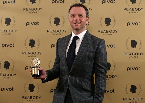 Fargo writer-creator Noah Hawley poses with one of his many awards