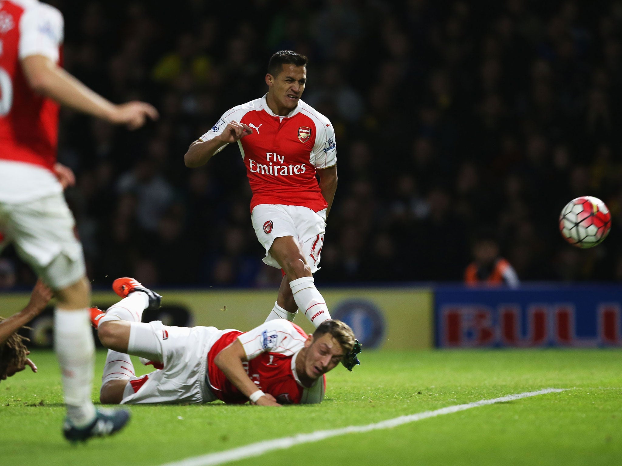 Alexis Sanchez scores the opening goal against Watford