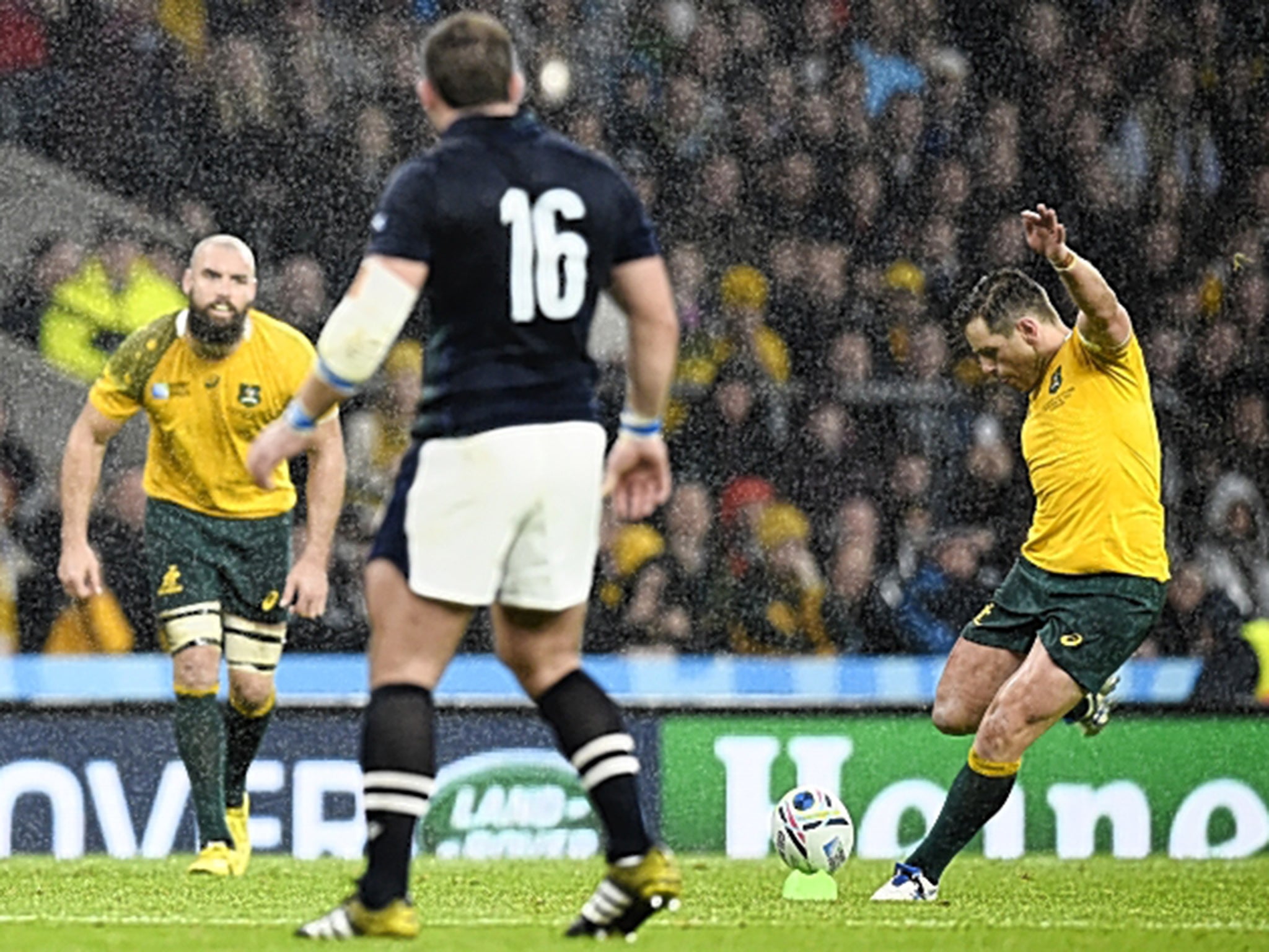 Bernard Foley kicks the match-winning penalty for Australia