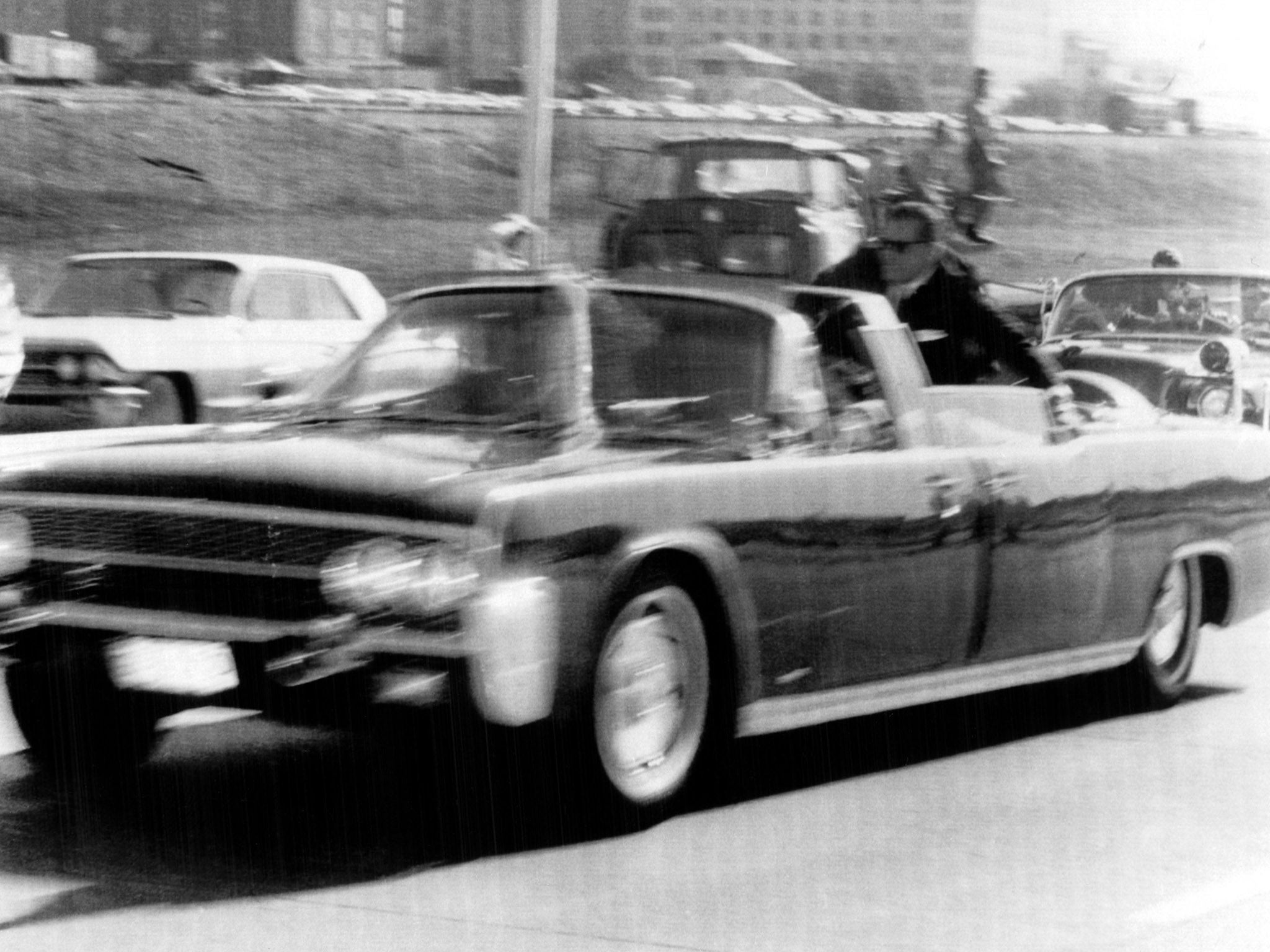 President John F. Kennedy is rushed towards Parkland Hospital after he's hit by an assassin's bullet