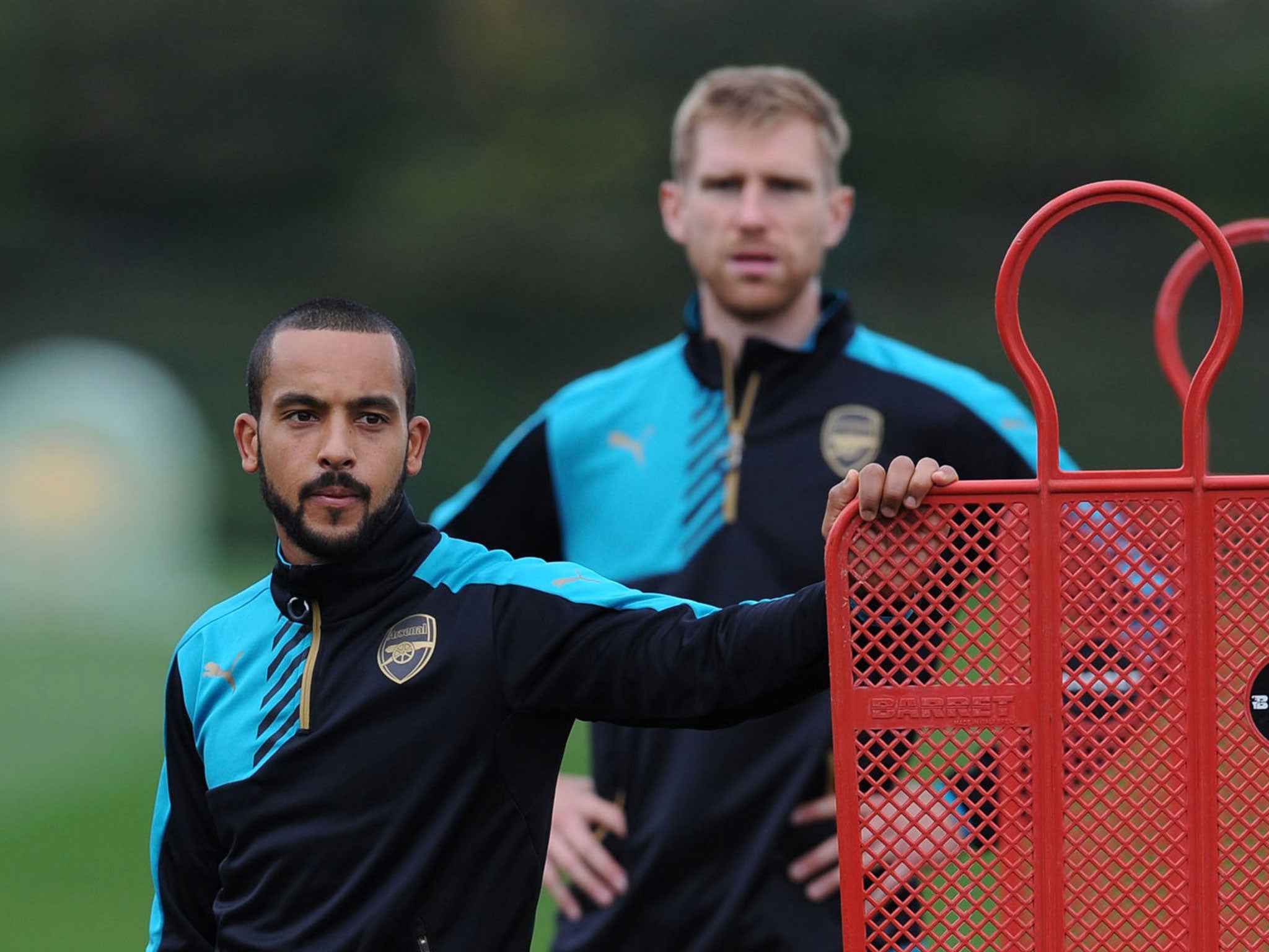 Theo Walcott and Per Mertesacker