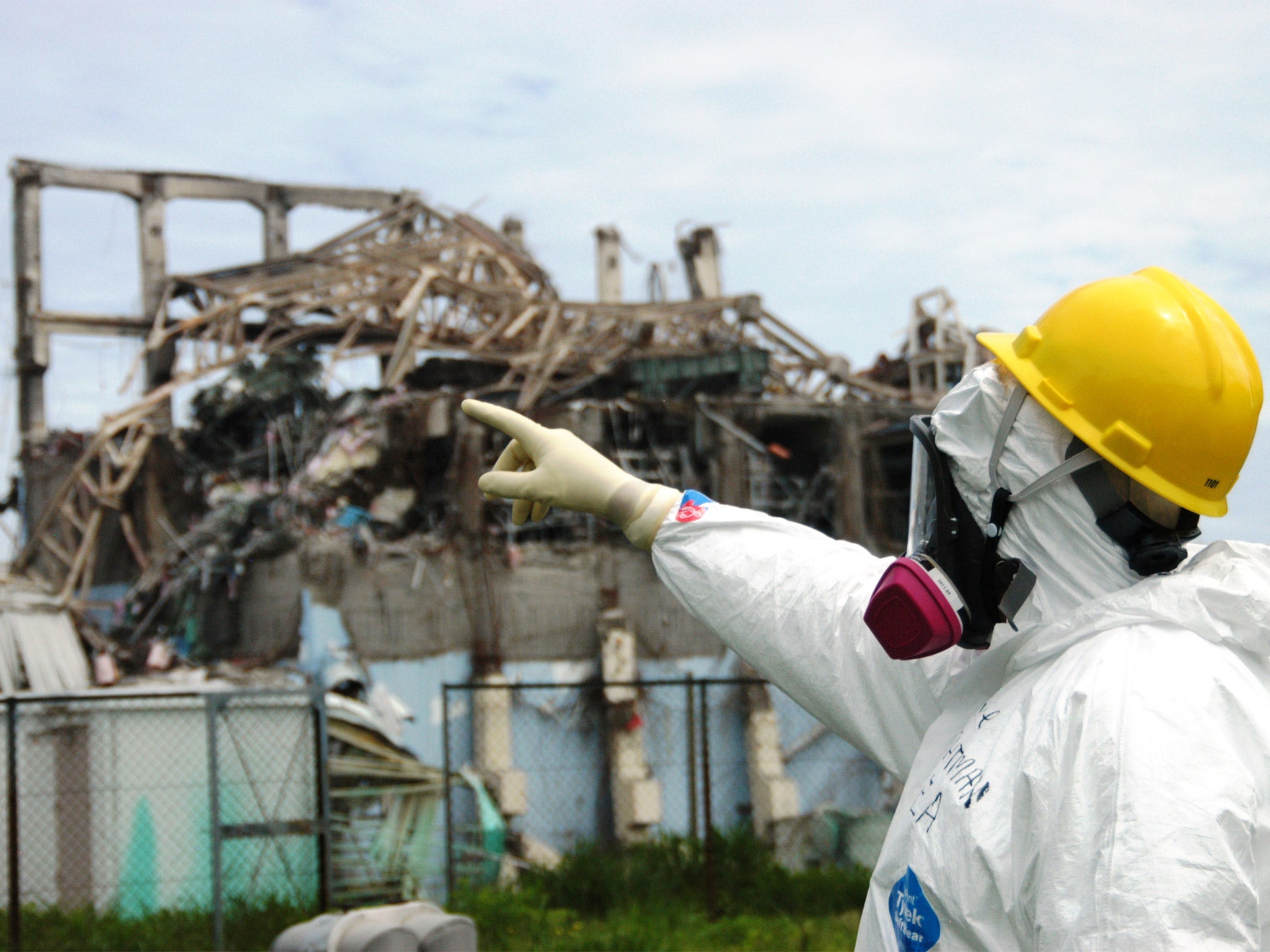 &#13;
Mike Weightman, a fact-finding team leader at the IAEA, inspects reactor unit 3 at the Fukushima Daiichi nuclear plant in May 2011 &#13;