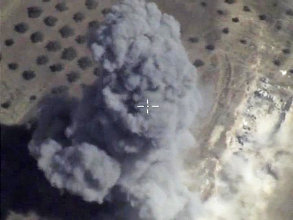 An image taken from footage released by the Russian Air Force on Monday showing an airstrike in Latakia Province, Syria