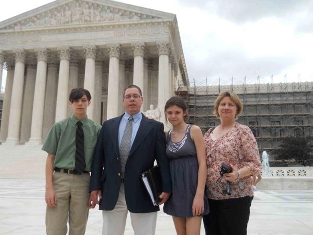 The Maineses in front of the Supreme Court during a family trip to Washington