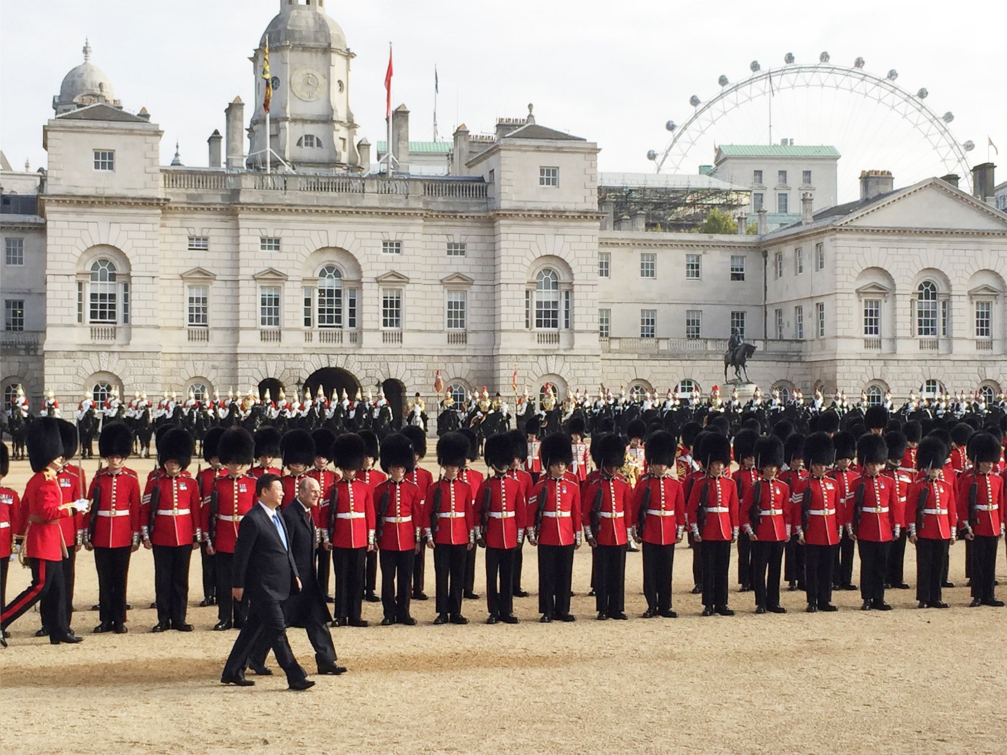 The Duke of Edinburgh accompanies President Xi Jinping, as he inspects a Guard of Honour on Horse Guards Parade