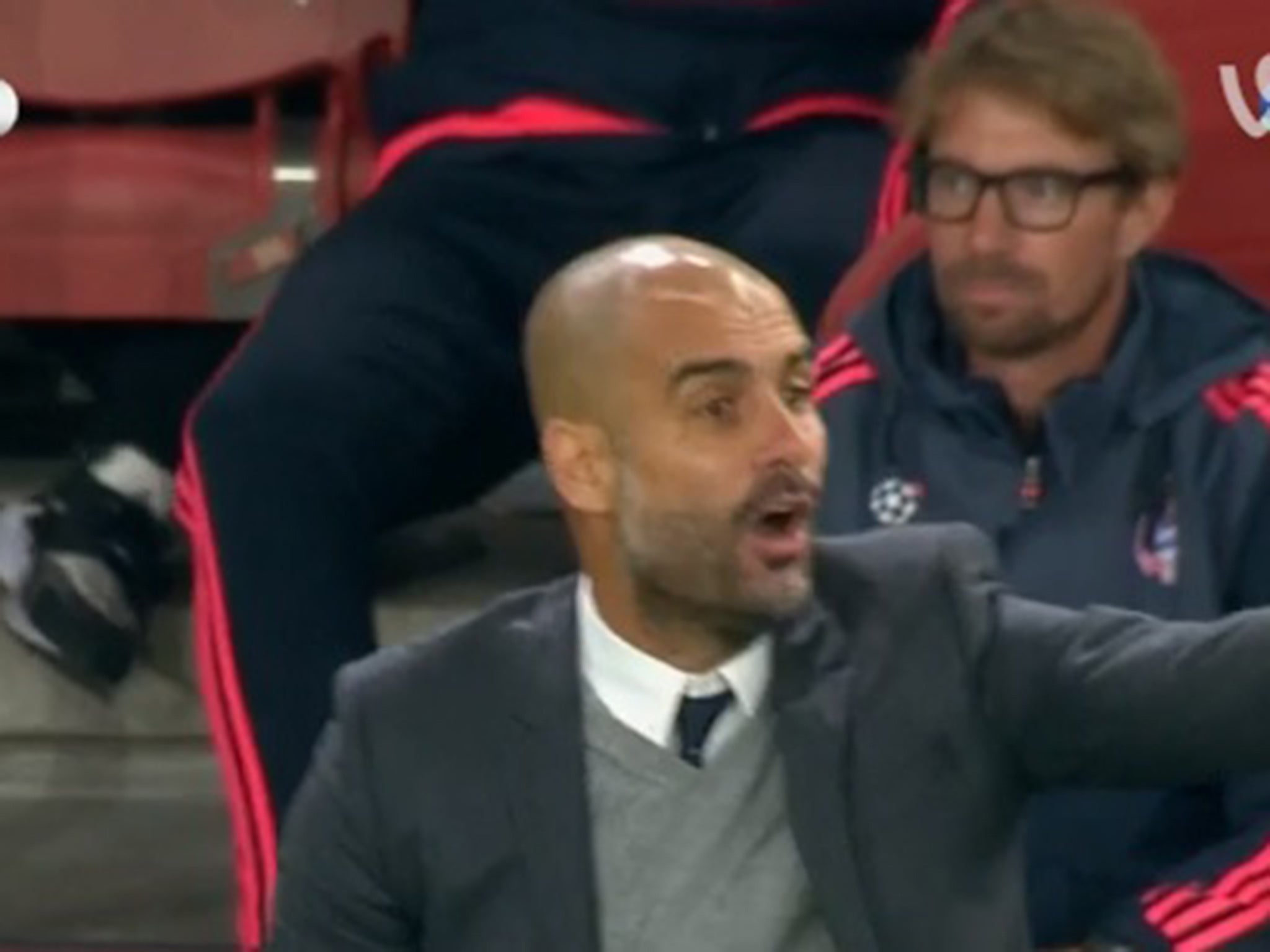 Andreas Kornmayer sits behind Pep Guardiola