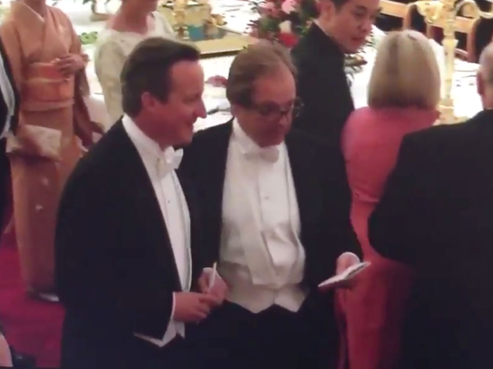 David Cameron speak with Hugo Swire
