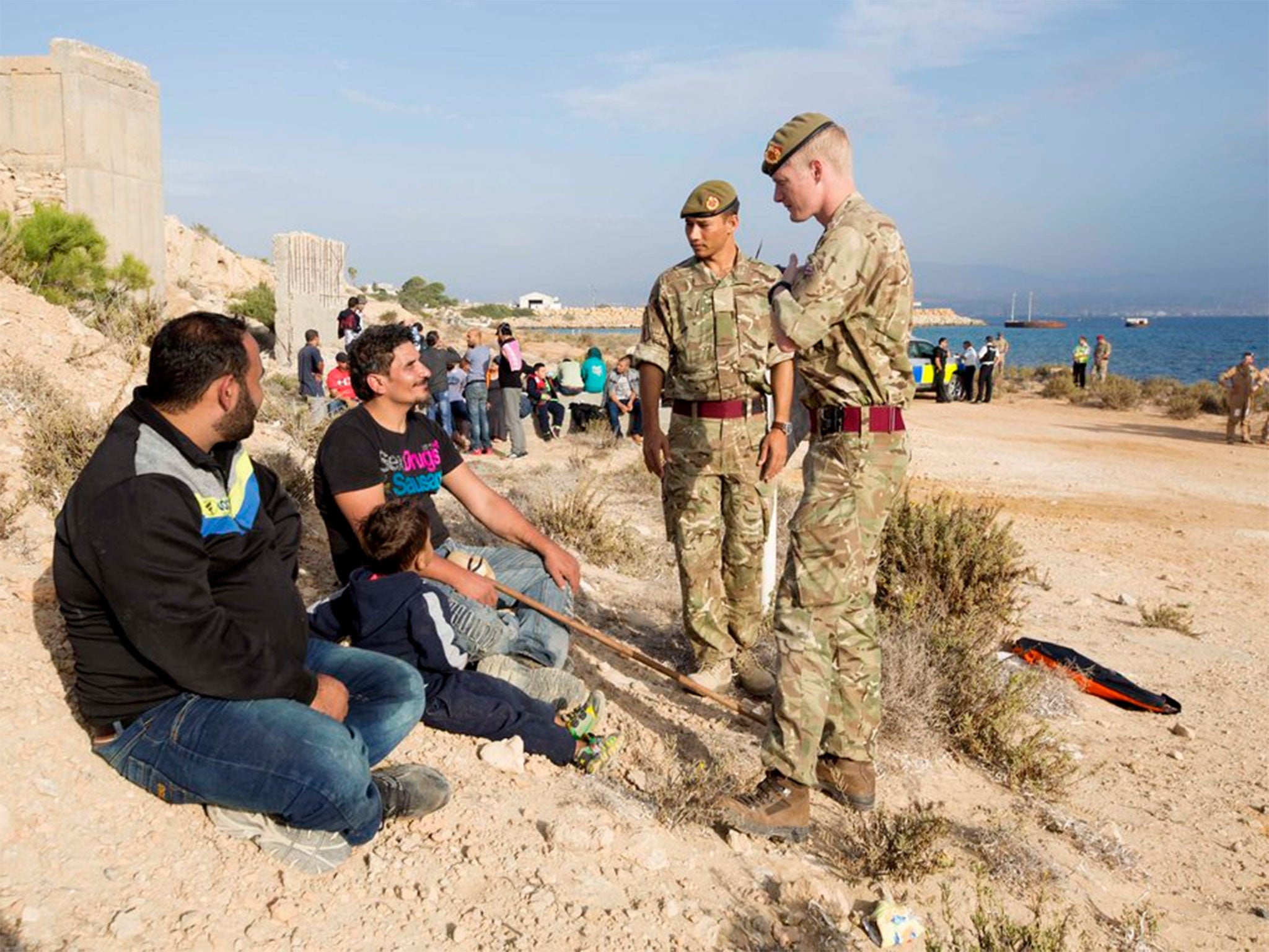 Refugees arriving at an RAF base in Cyprus