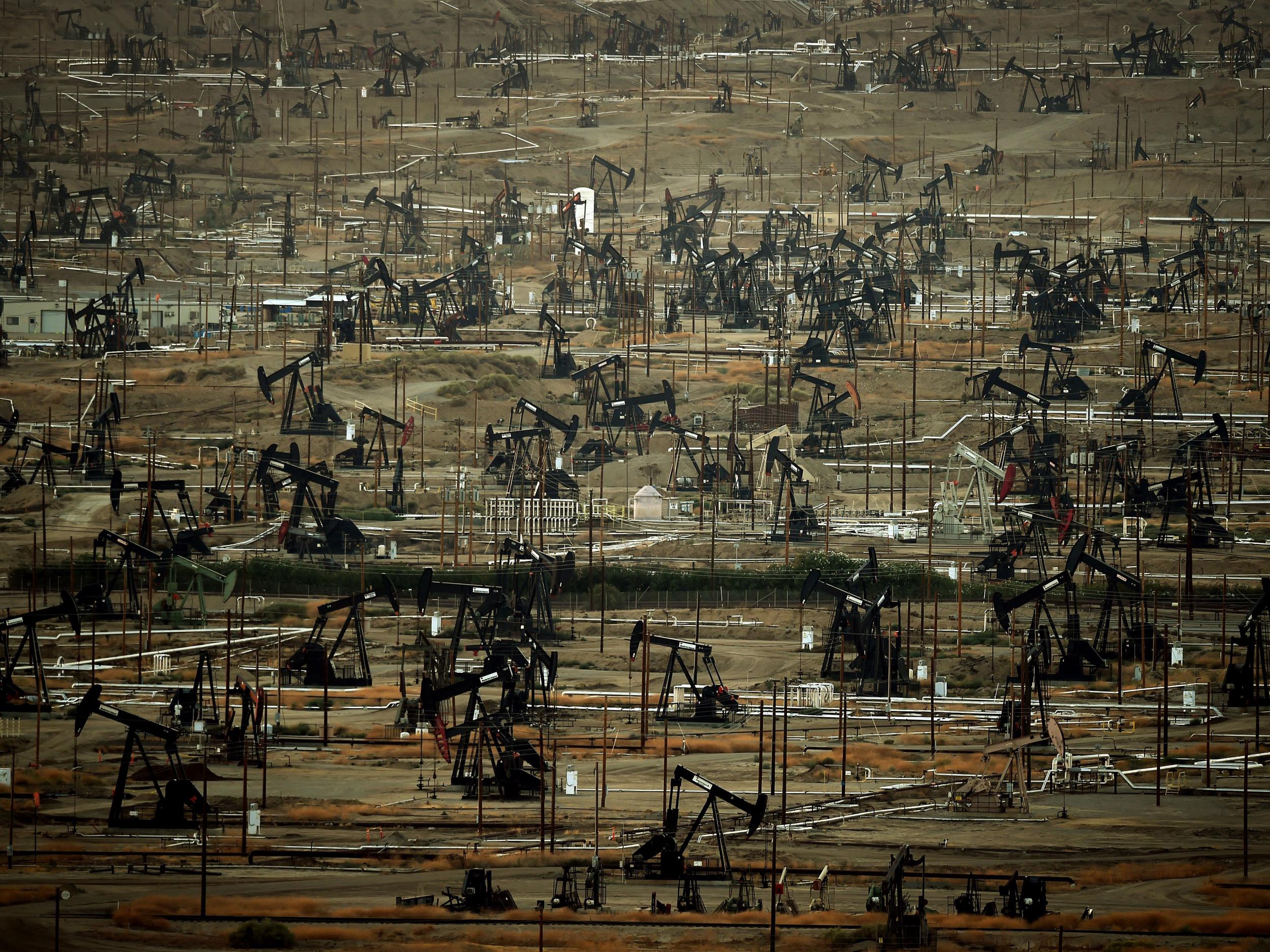 Oil pumping jacks and drilling pads at the Kern River Oil Field where the principle operator is the Chevron Corporation in Bakersfield, California. The field is the third largest in California, fifth largest in the United States